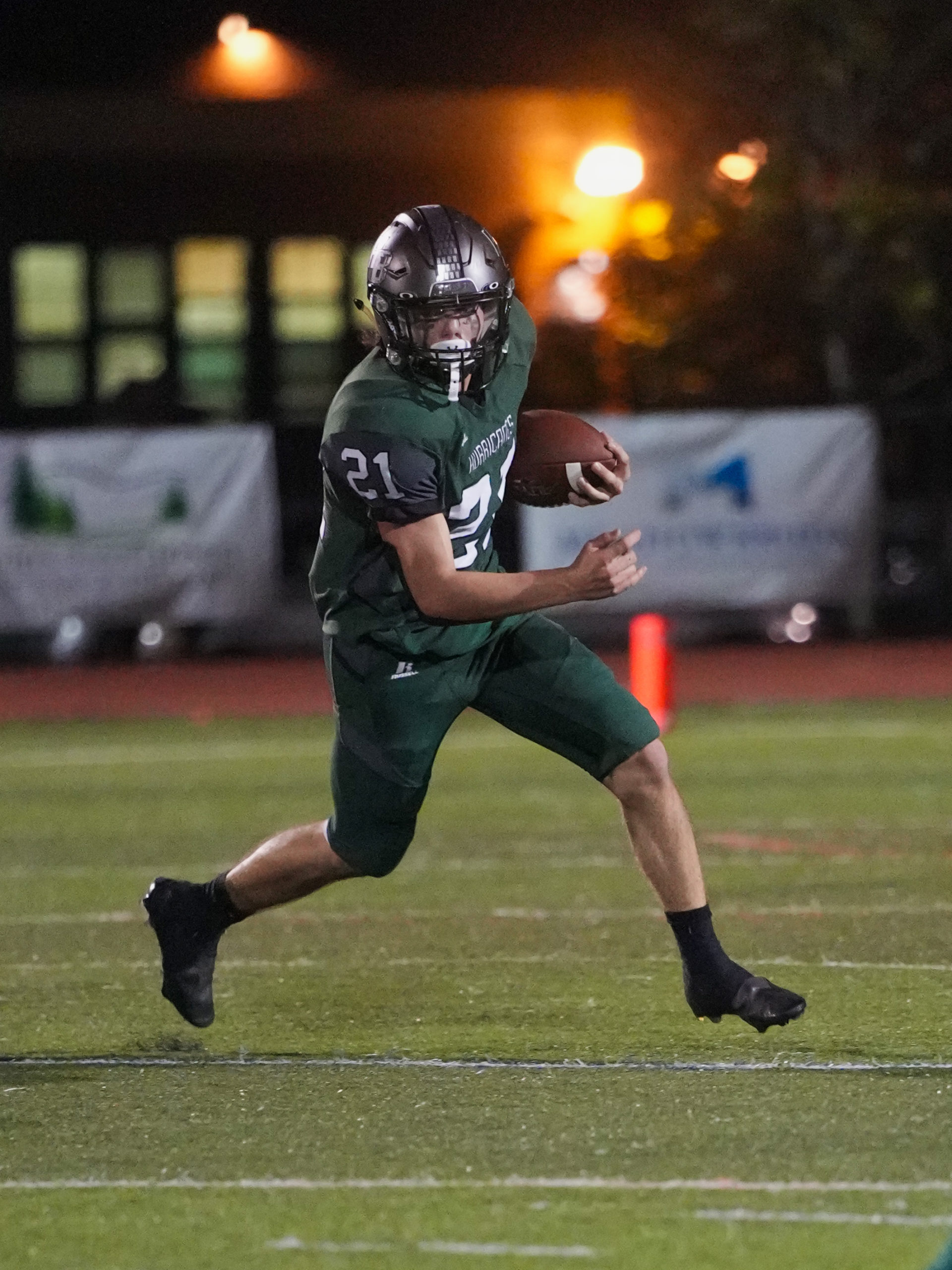 Nolan Michalowski of Westhampton Beach gains positive yards late in Friday night's victory.