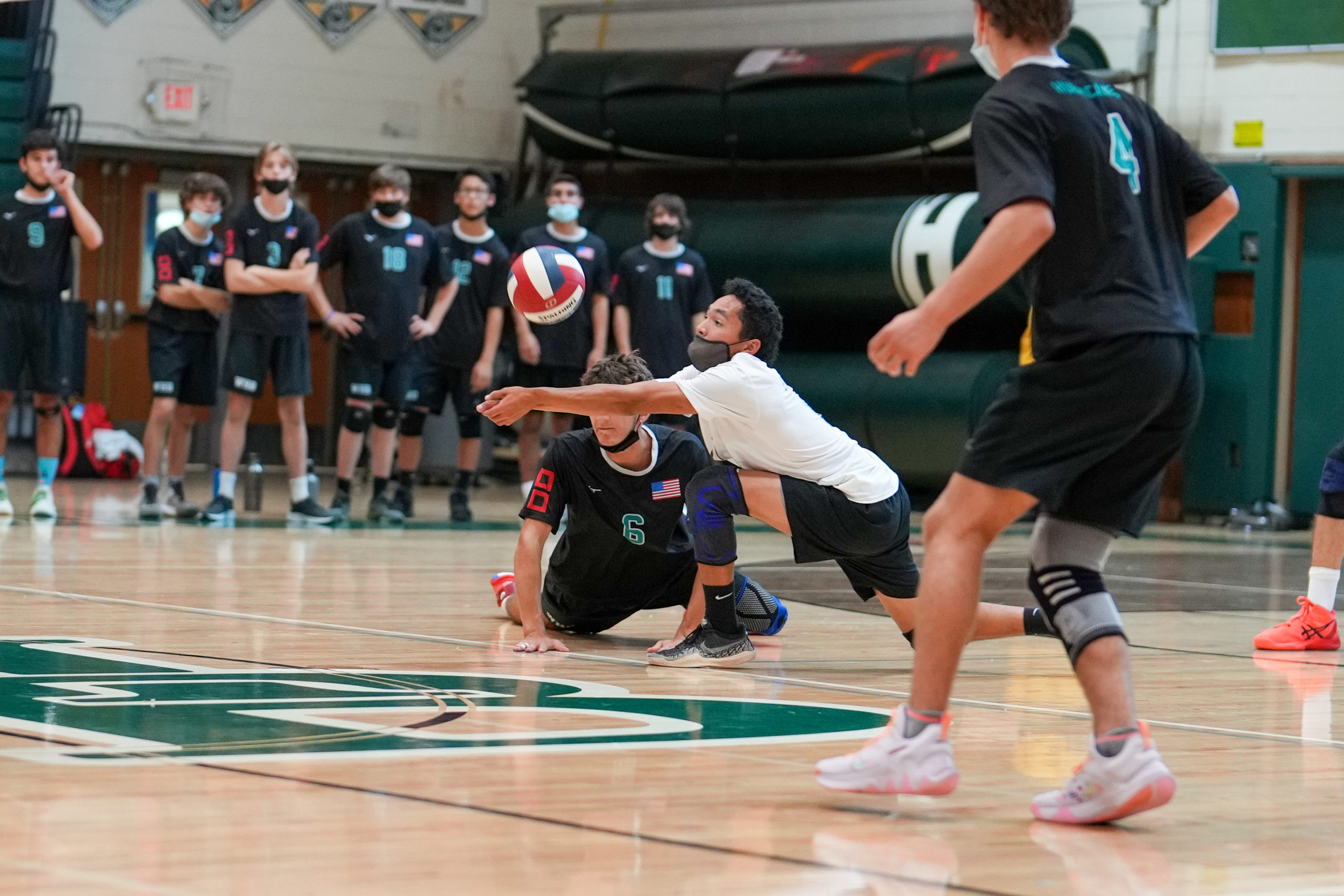 Westhampton Beach senior libero Josh Aponte digs out a return.