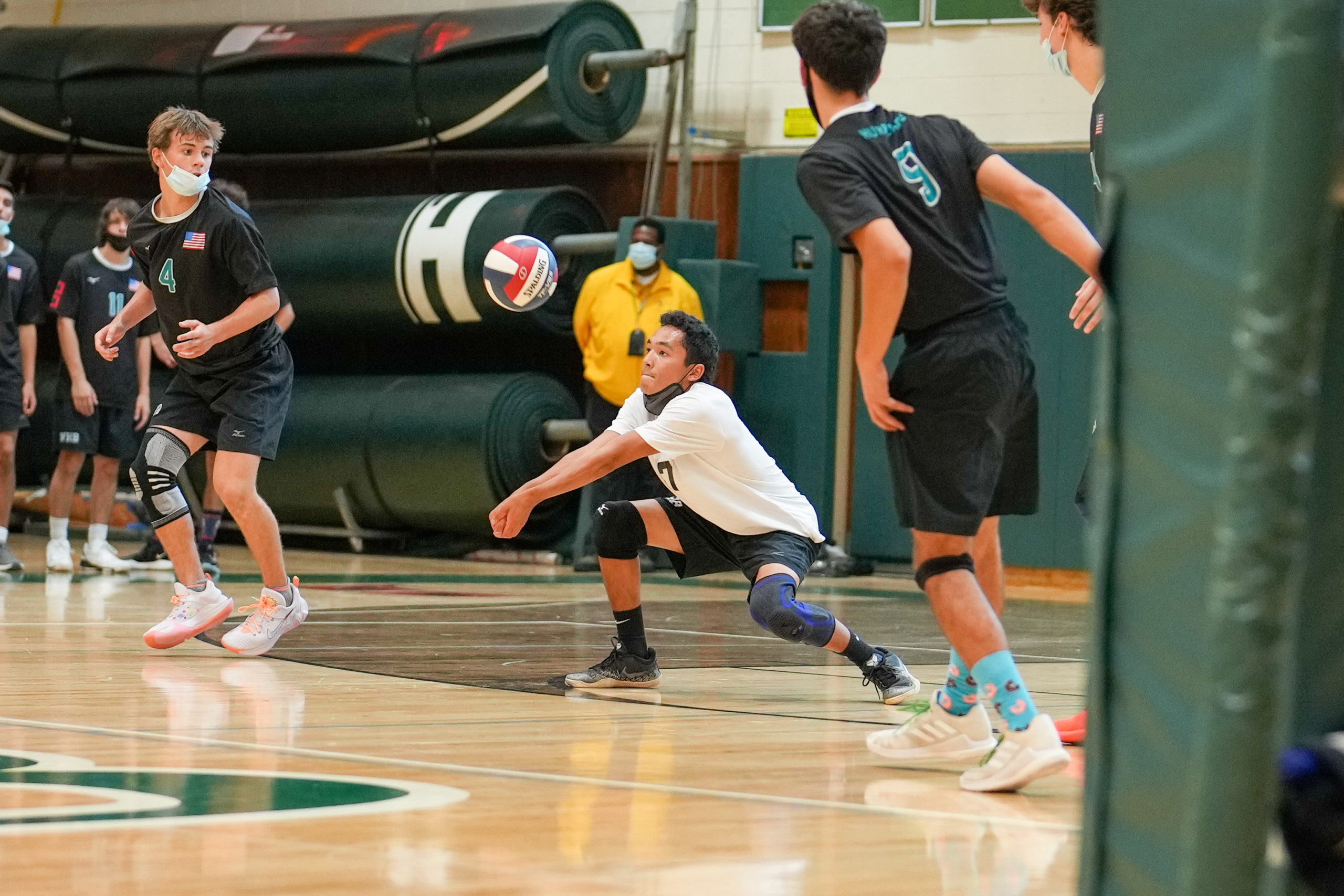 Westhampton Beach senior libero Josh Aponte digs out a return.