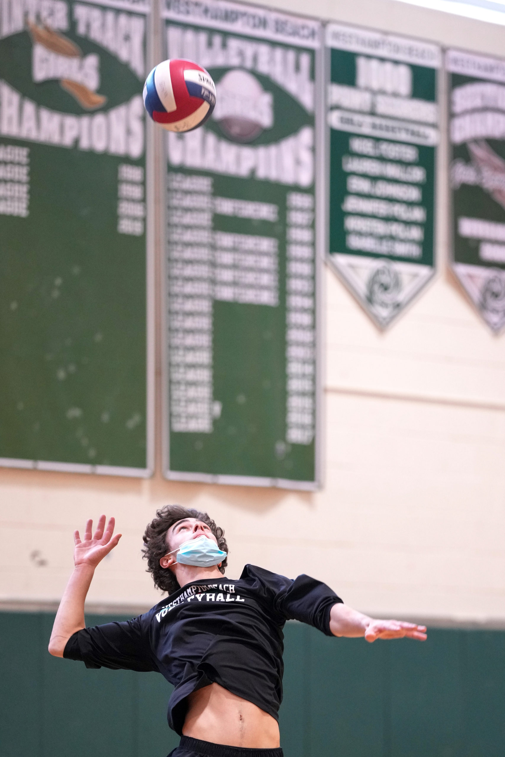 Westhampton Beach senior middle hitter Colbie Mason serves the ball.