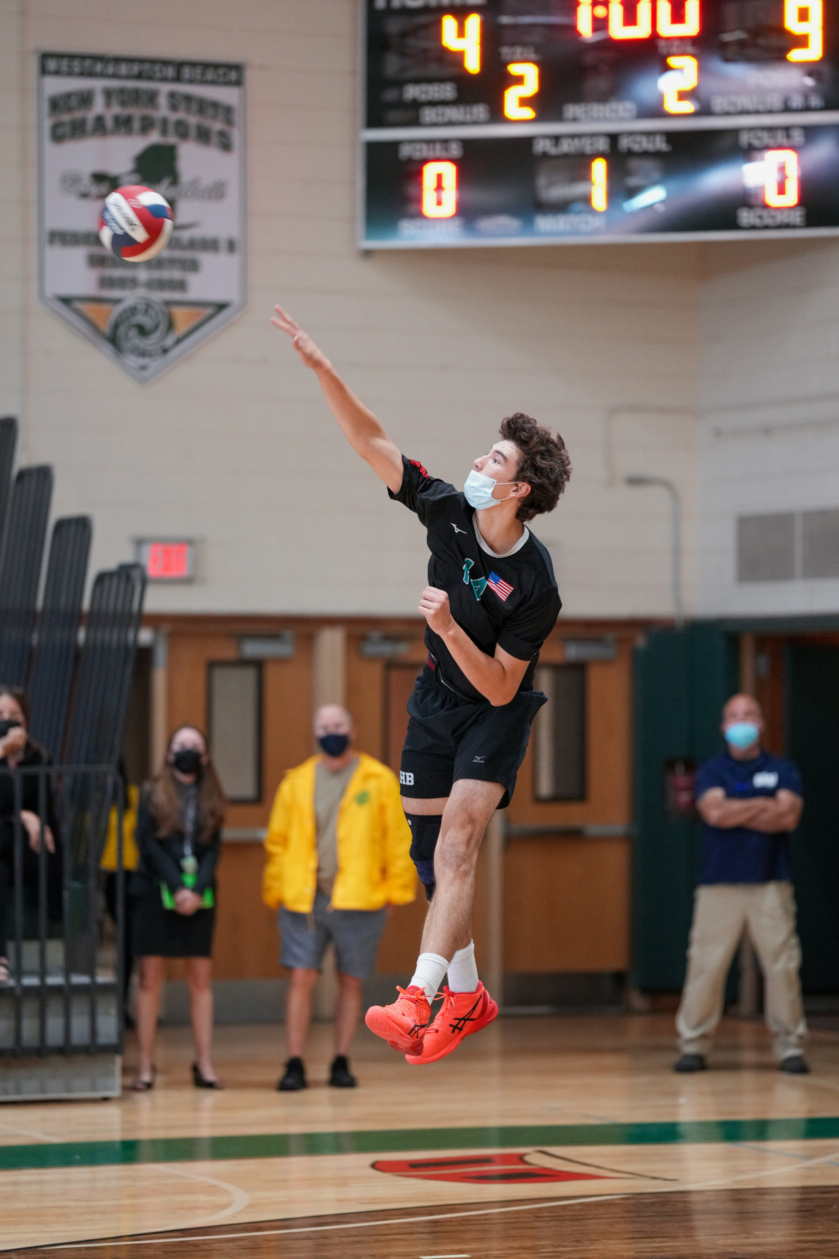 Westhampton Beach senior outside hitter Daniel Haber serves the ball.