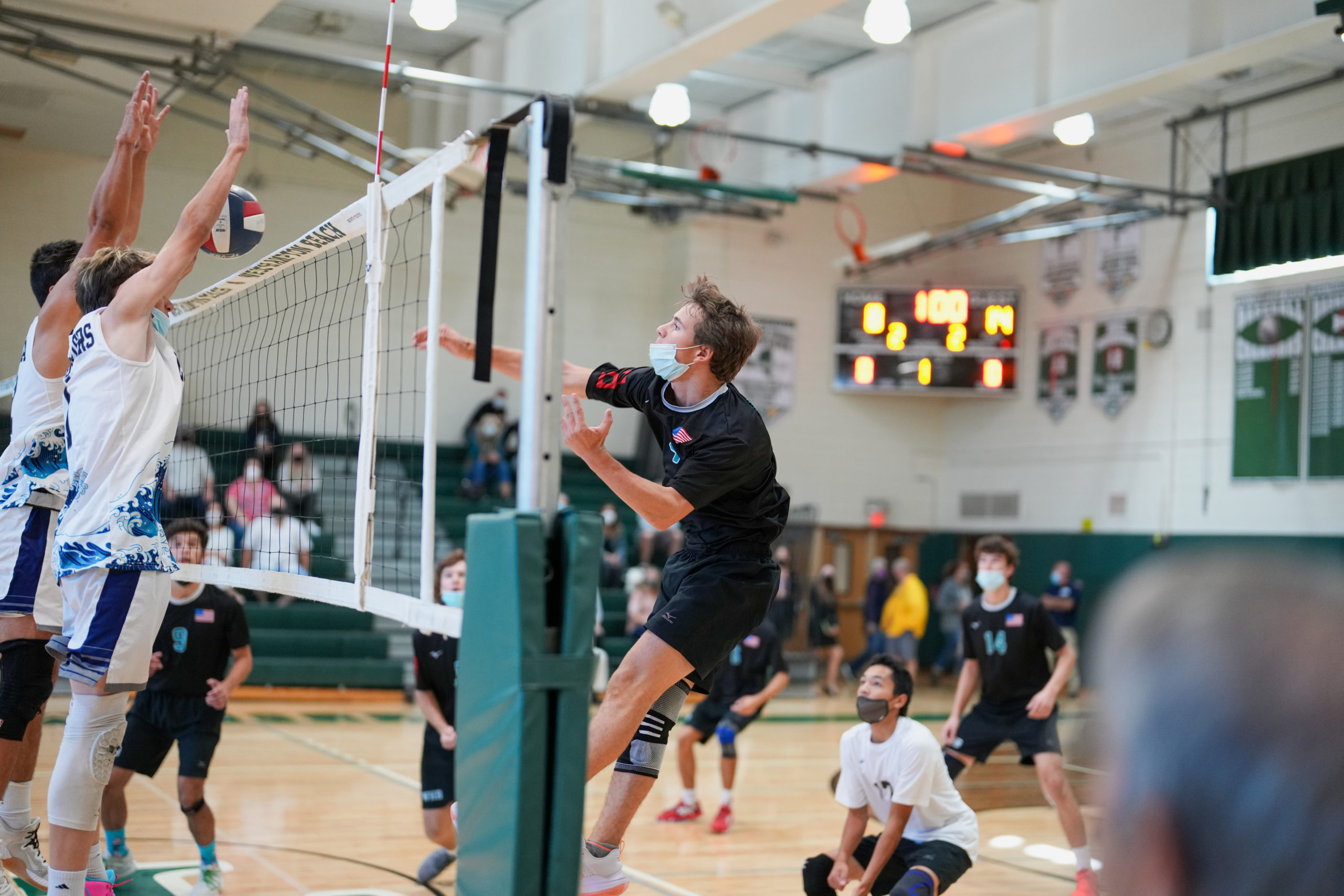 A Westhampton Beach player spikes the ball.