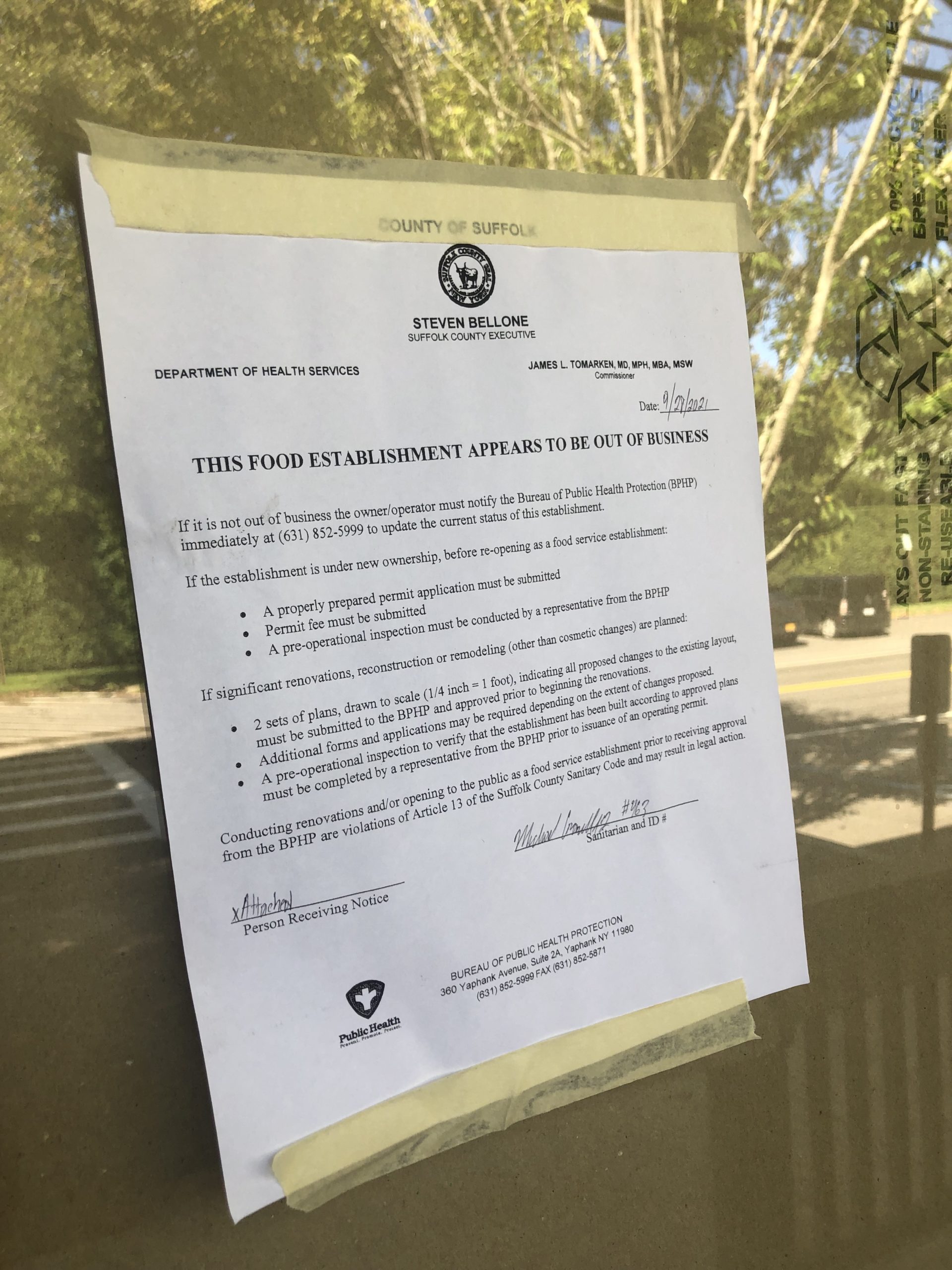 A note from the Suffolk County Department of Health Services posted to the front door of the Sagaponack General Store building late last month.