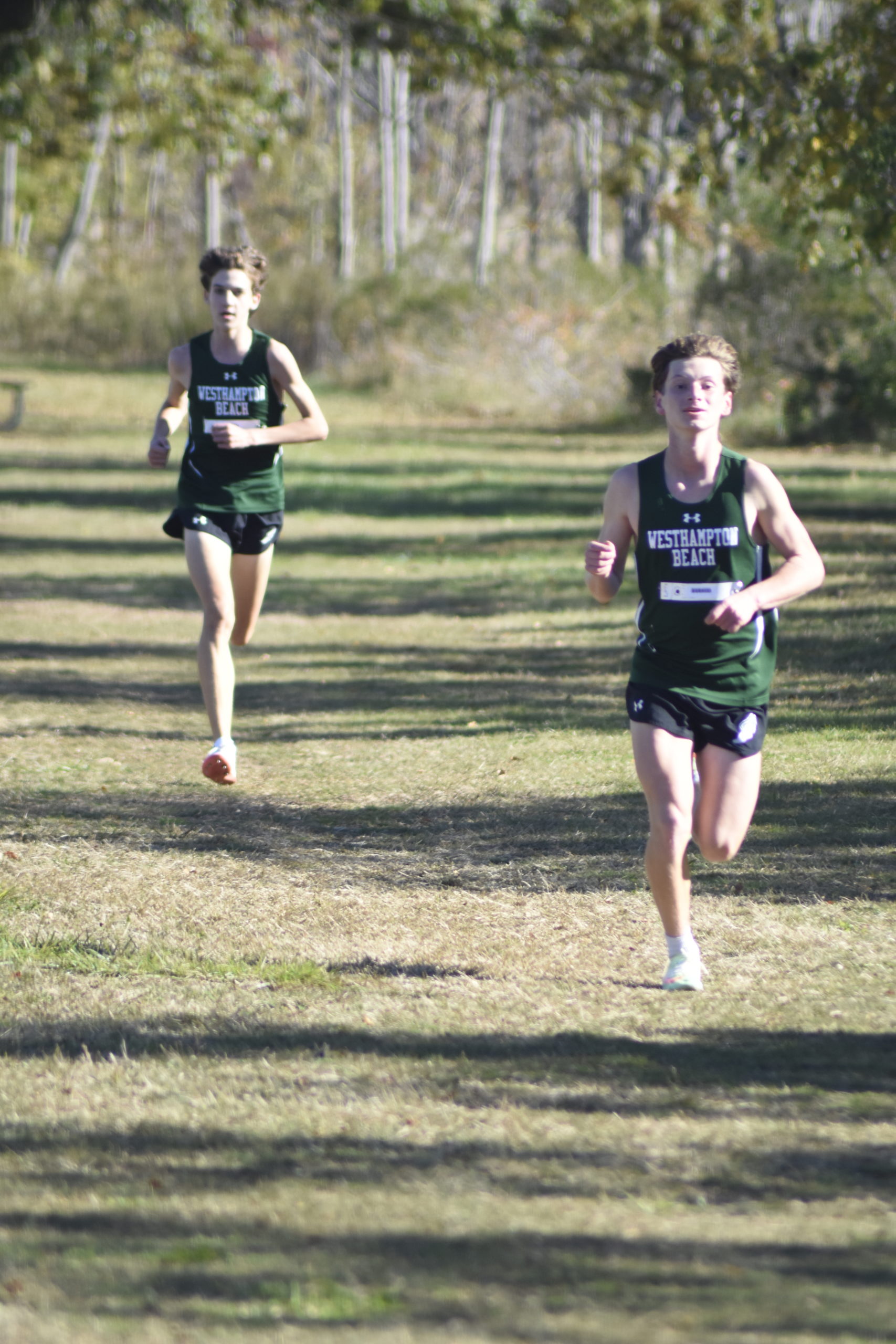 Max Haynia, with teammate Trevor Hayes trailing him, follow in teammate Gavin Ehlers.