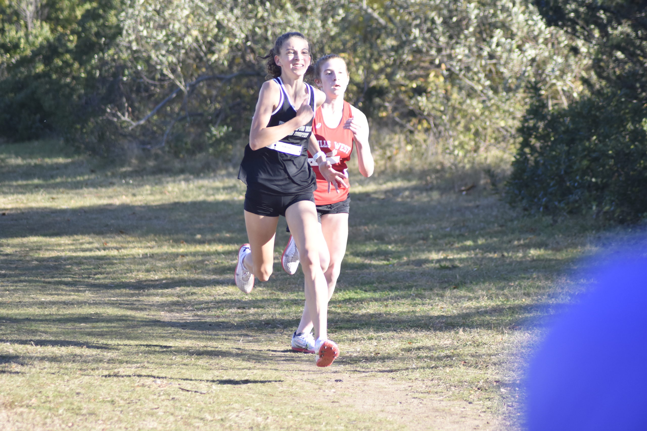 Westhampton Beach freshman Jamie Kelly races toward the finish line.