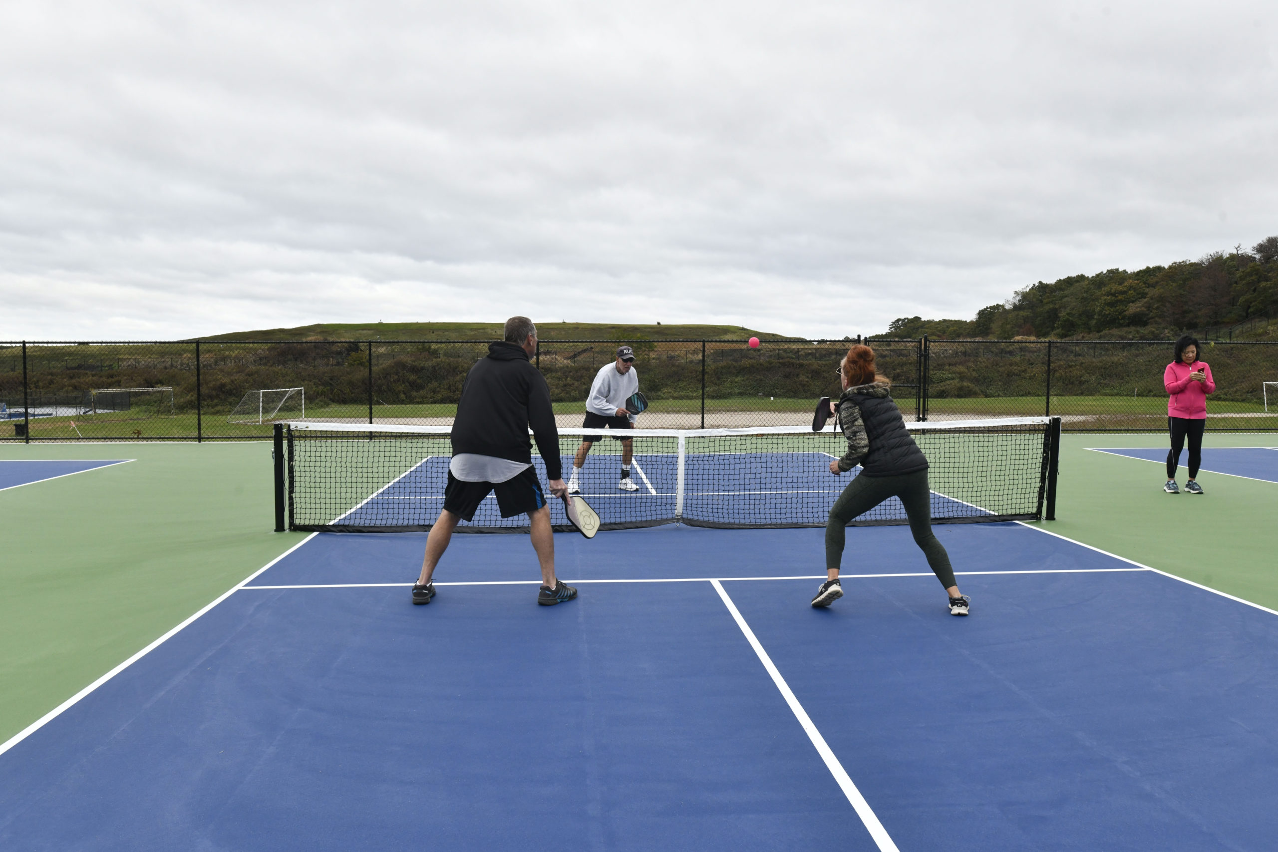 Pickleball enthusiasts try out the new pickleball courts at the North Sea Community Park on October 27.  DANA SHAW