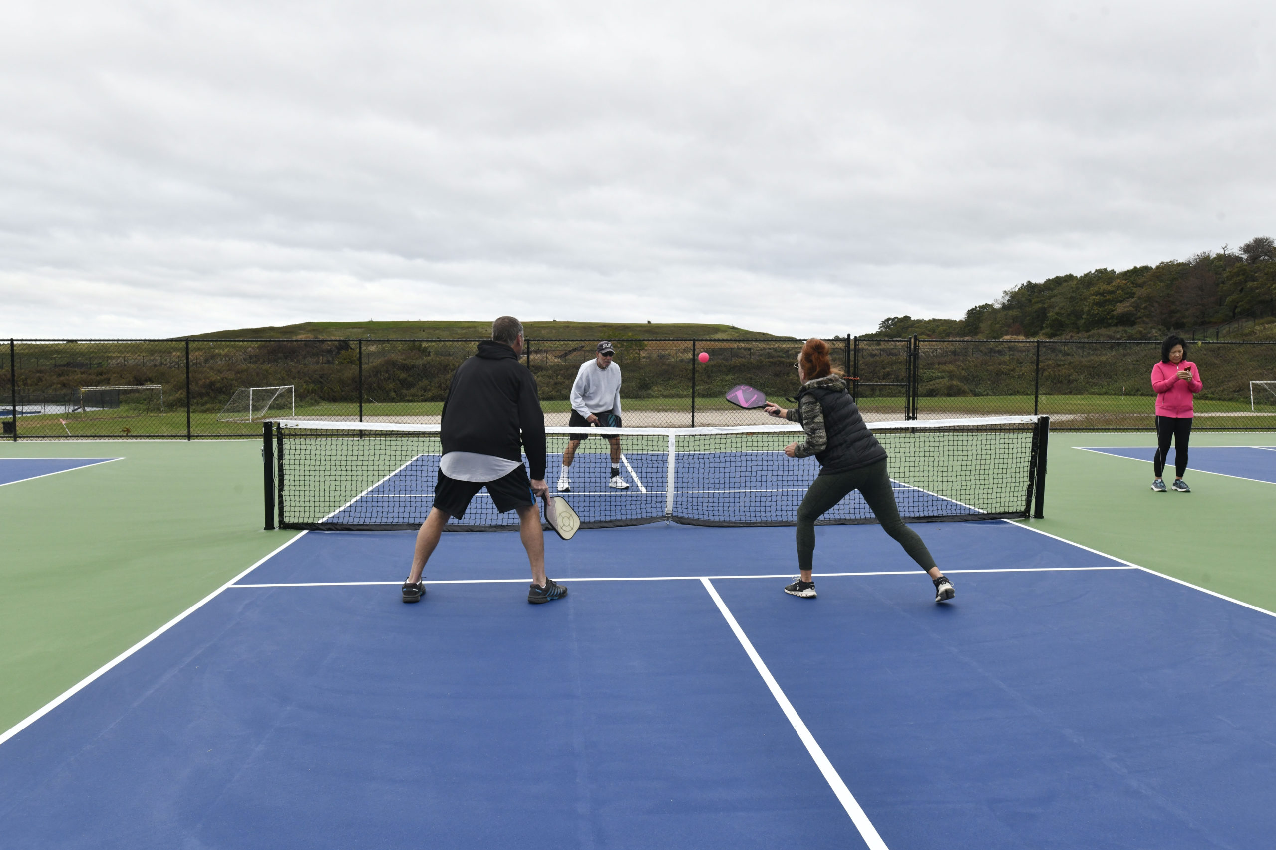 Pickleball enthusiasts try out the new pickleball courts at the North Sea Community Park on October 27.  DANA SHAW