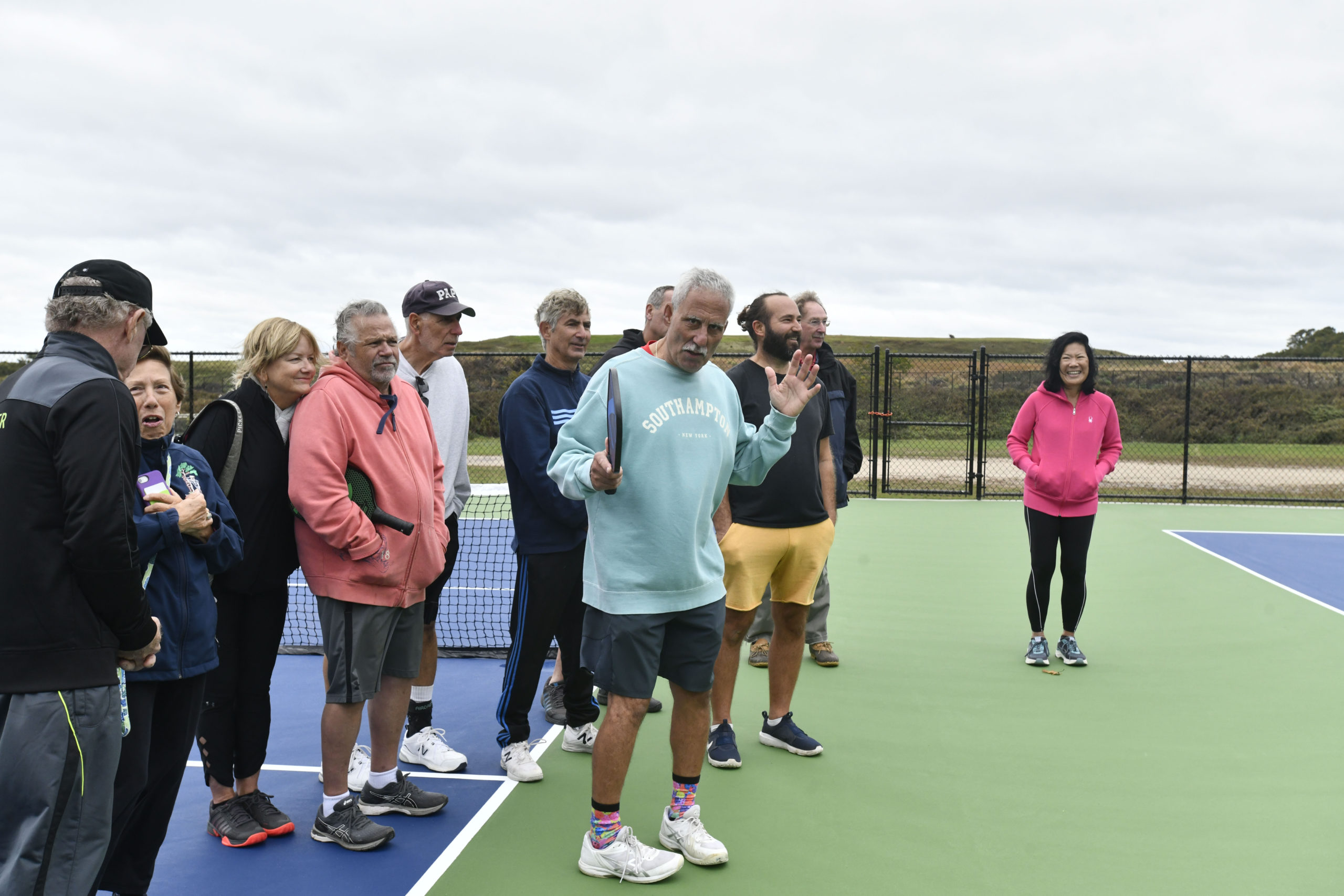 Pickleball enthusiast Vinnie Mangano speaks at the ribbon cutting of the new courts at North Sea Community Park.  DANA SHAW