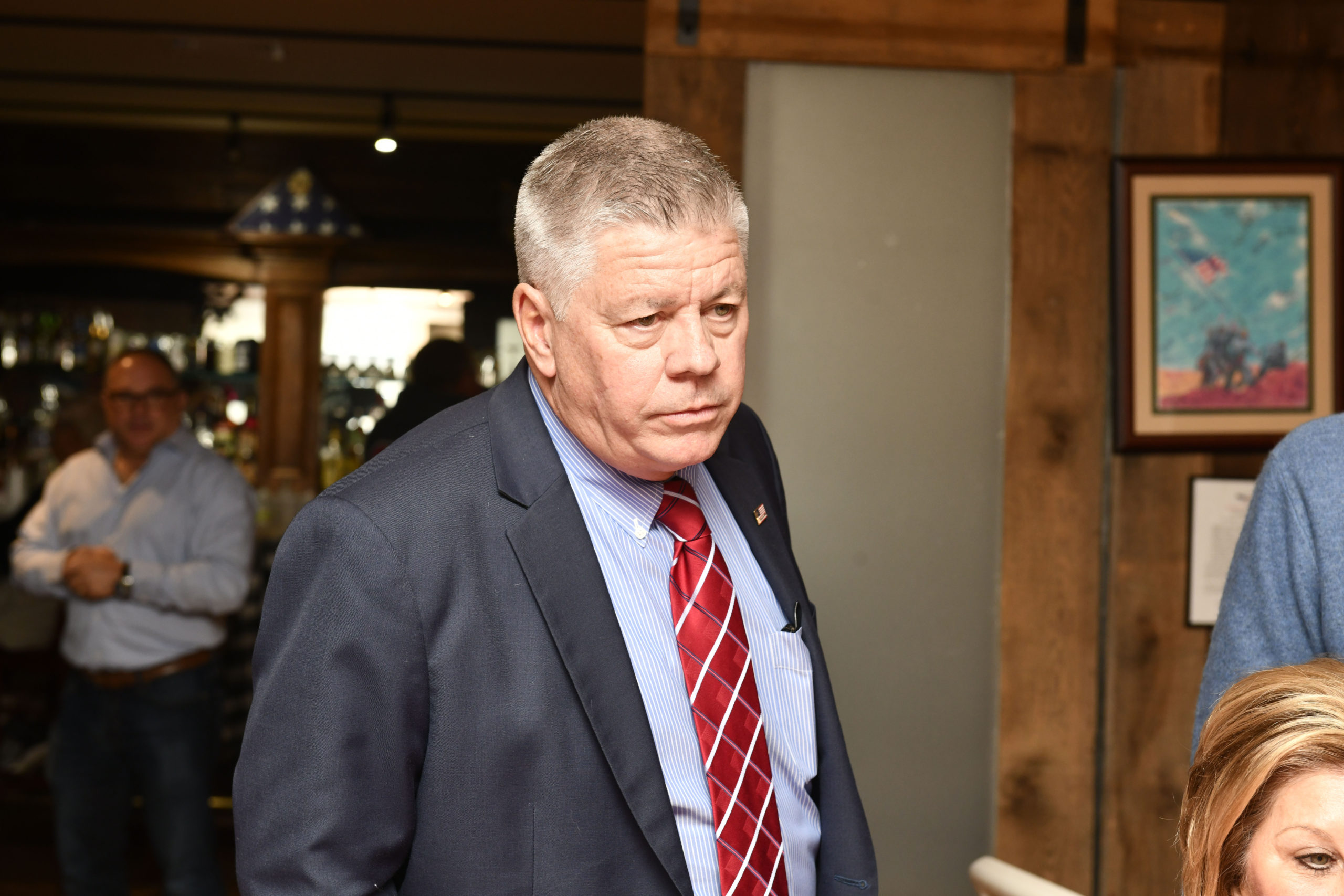 Southampton Republican Committee Chirman David Betts watches as election results come in.  DANA SHAW