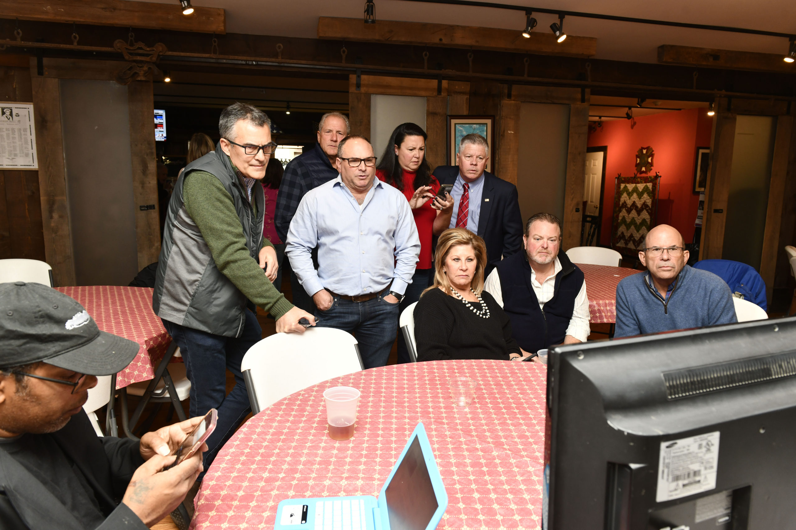 Republican cnadidates and supporters watch as election results come in at the Westhampton Beach VFW on Tuesday night.  DANA SHAW