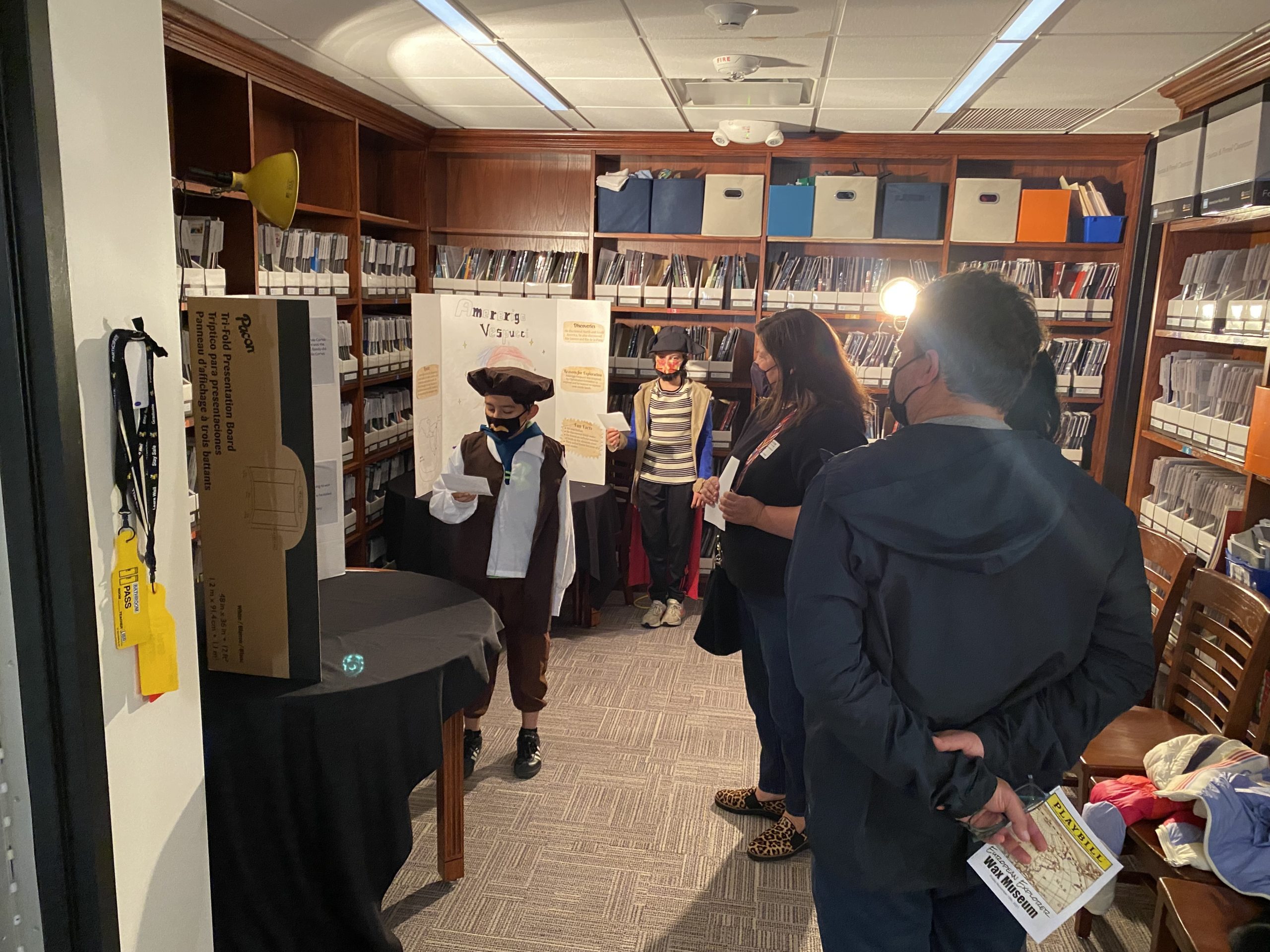 Visitors listen to a presentation at the Bridghampton School's fifth grade wax museum.