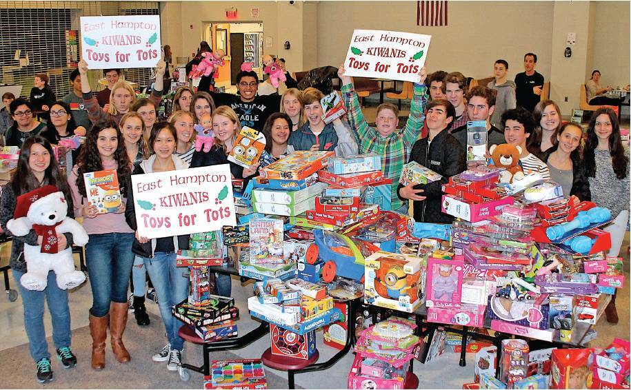 Key Club students sorted and packed toys for the Kiwanis Club of East Hampton Toys For Tots program at the high school cafeteria in 2015.  KYRIL BROMLEY