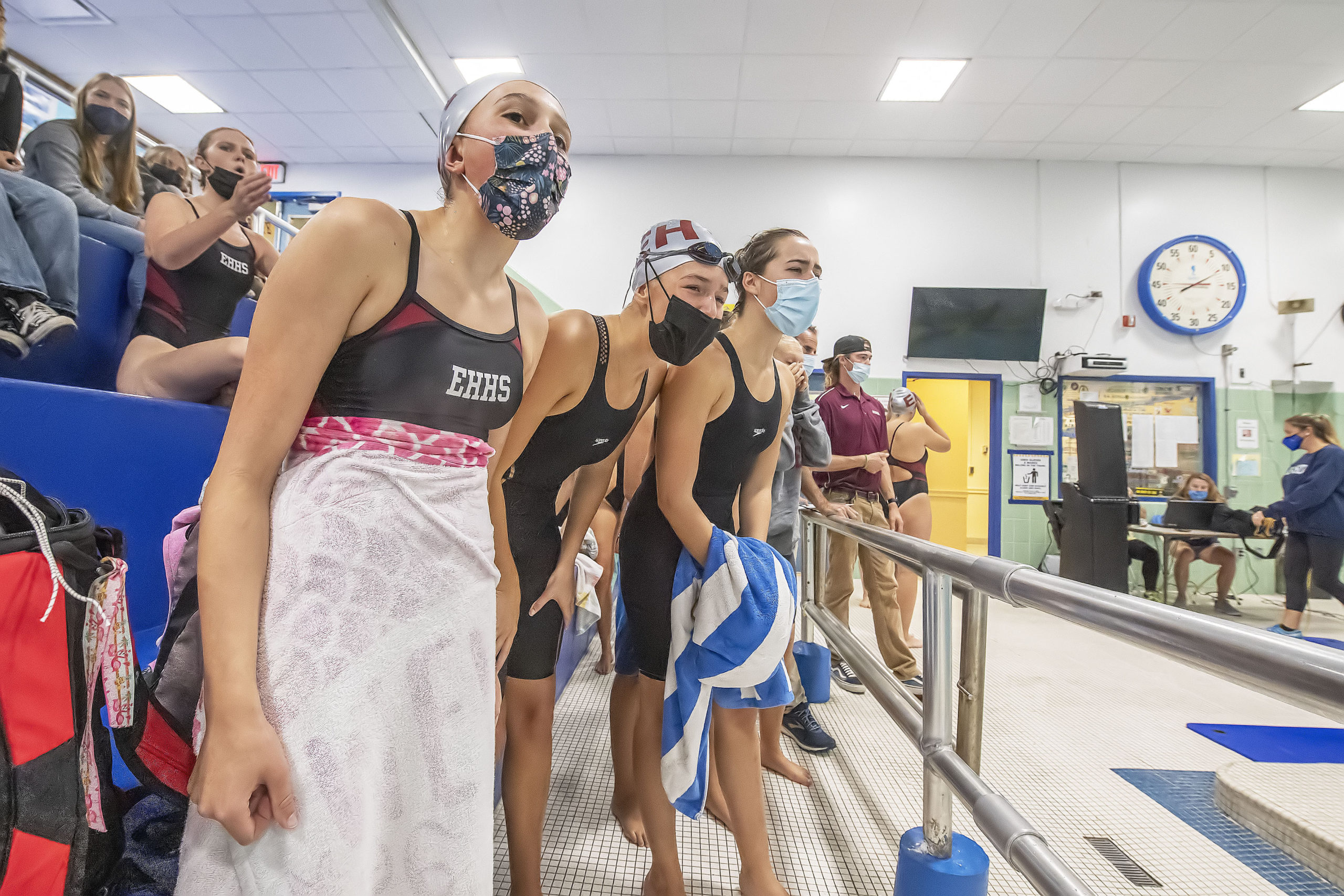 East Hampton swimmers cheer on their teammates.