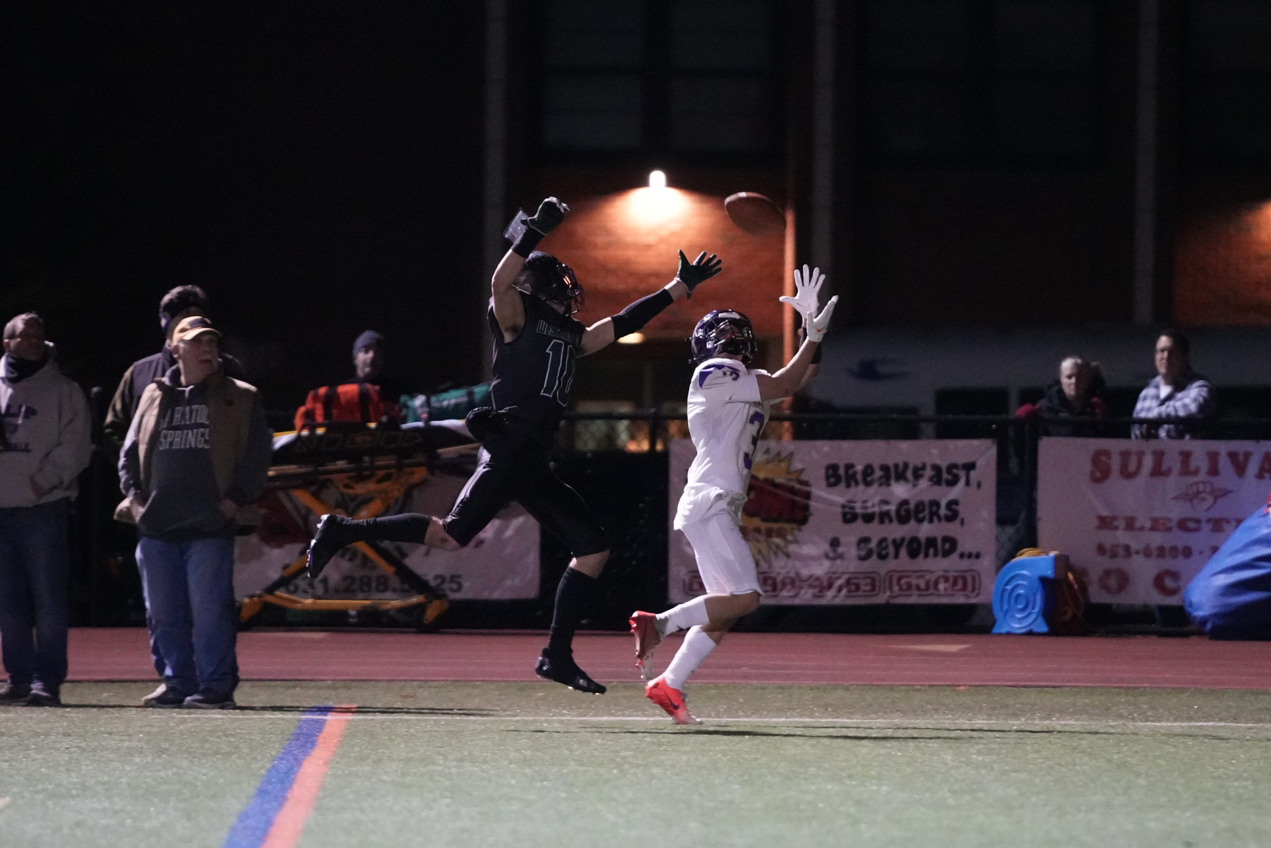 Westhampton Beach senior Christian Killoran nearly deflects a pass that is instead caught by an Islip player for a touchdown.