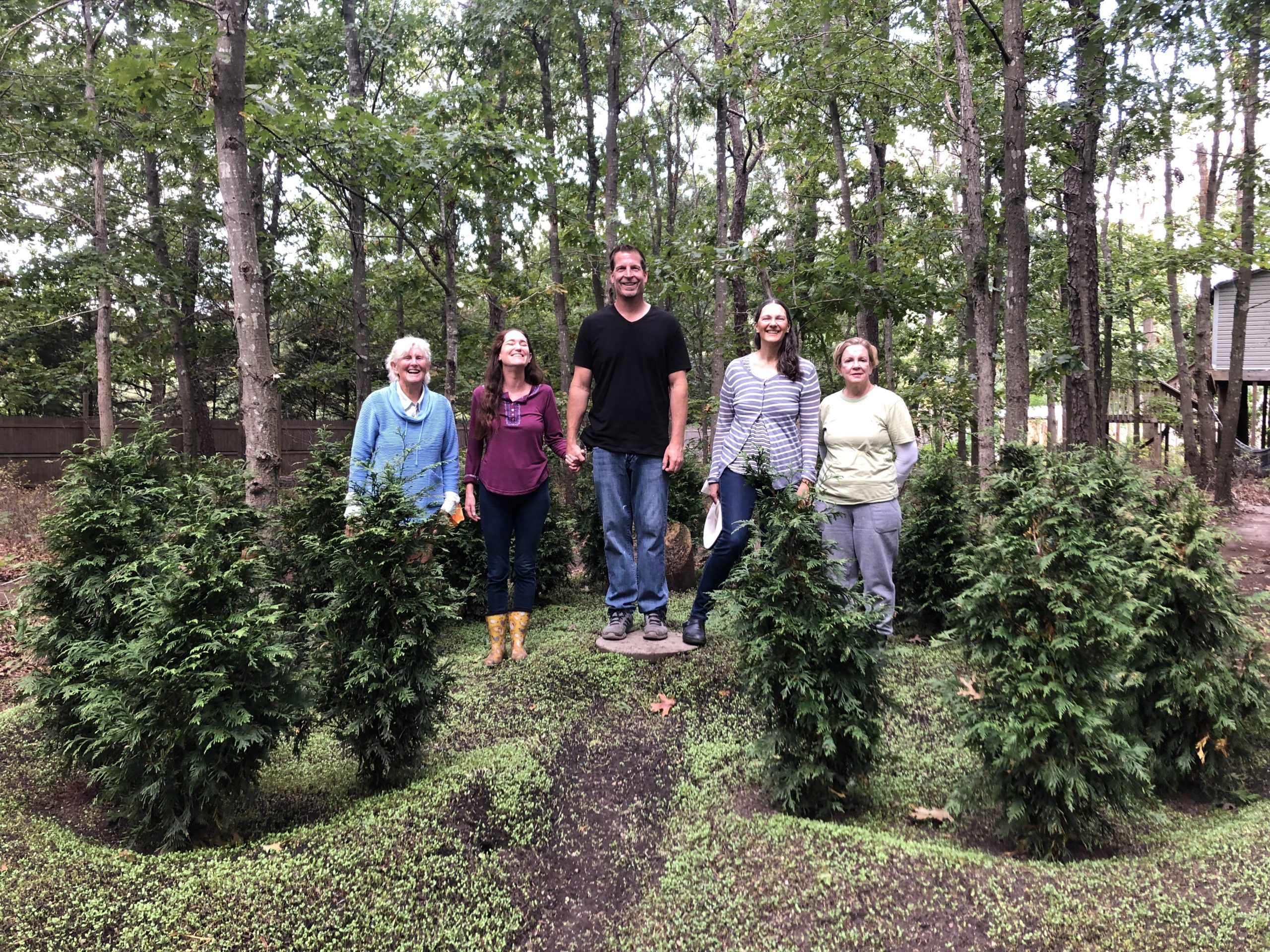 Some September CREW members took a field trip to the home of Susan Blacklocke and Soullas Sofar, where everything about the property is focused on protecting the planet, from beehives to water purifying Koi fish ponds. From left, Darr Reilly, Susan Blacklocke, Soullas Sofar, Ellen Greaves and Barbara Ham.