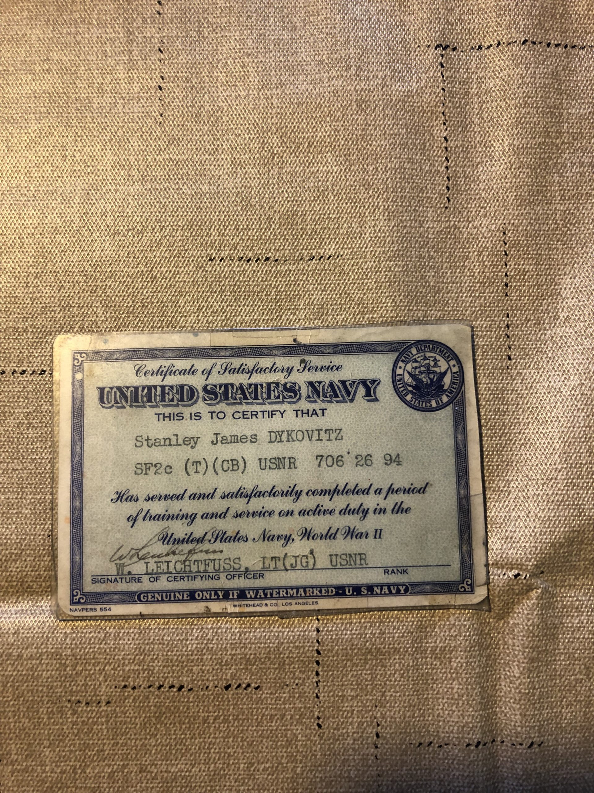 Stanley Dykovitz's discharge card from the Navy.