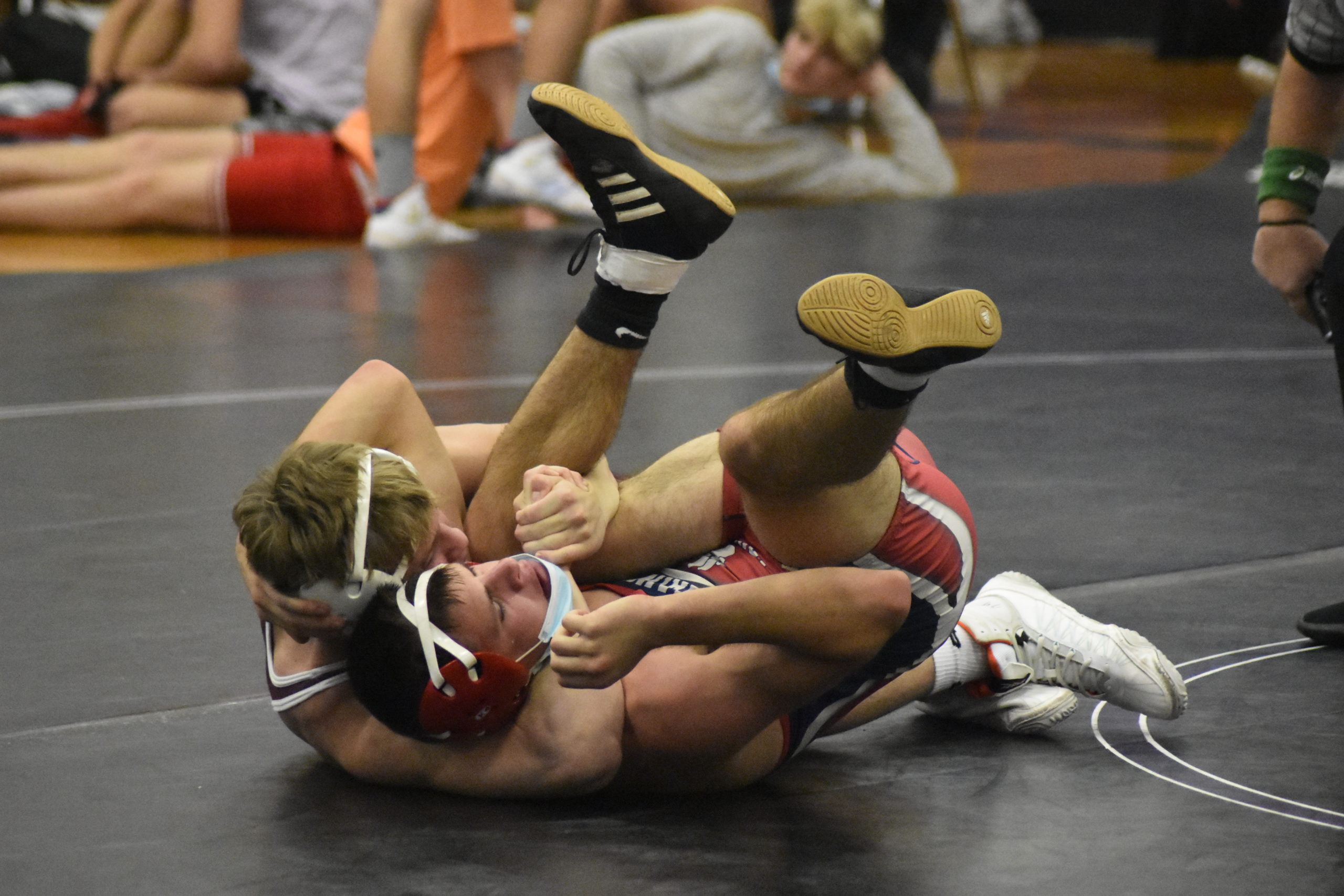 Mariner Cole Fox pinned Colby D`Andria of St. John The Baptist in the second period of their match on Saturday.