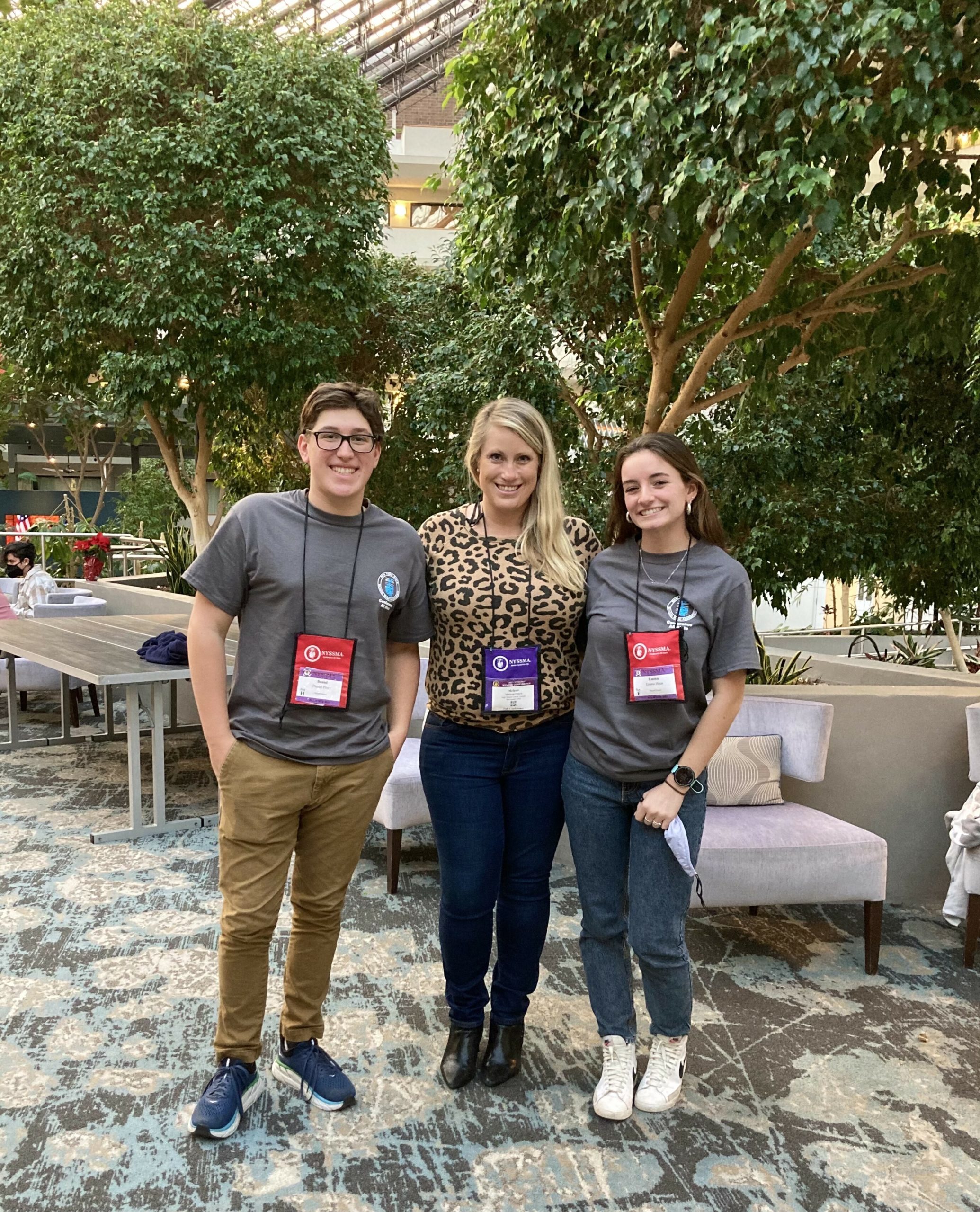 Two seniors from East Hampton High School, Emma Hren and Daniel Piver, participated in the NYSSMA All State Conference in Rochester recently, under the guidance of the school choral director, Melanie Freyre, center. The students submitted audition tapes last spring and were chosen to perform in the All- State Mixed Chorus.  Emma was chosen as one of only 20 in the Soprano I section and Daniel as only one of 20 in the Tenor 2 section in all of New York State. They traveled with Freyre to Rochester where they participated in over 18 hours of rehearsals to prepare for the concert at the historic Eastman Theatre.