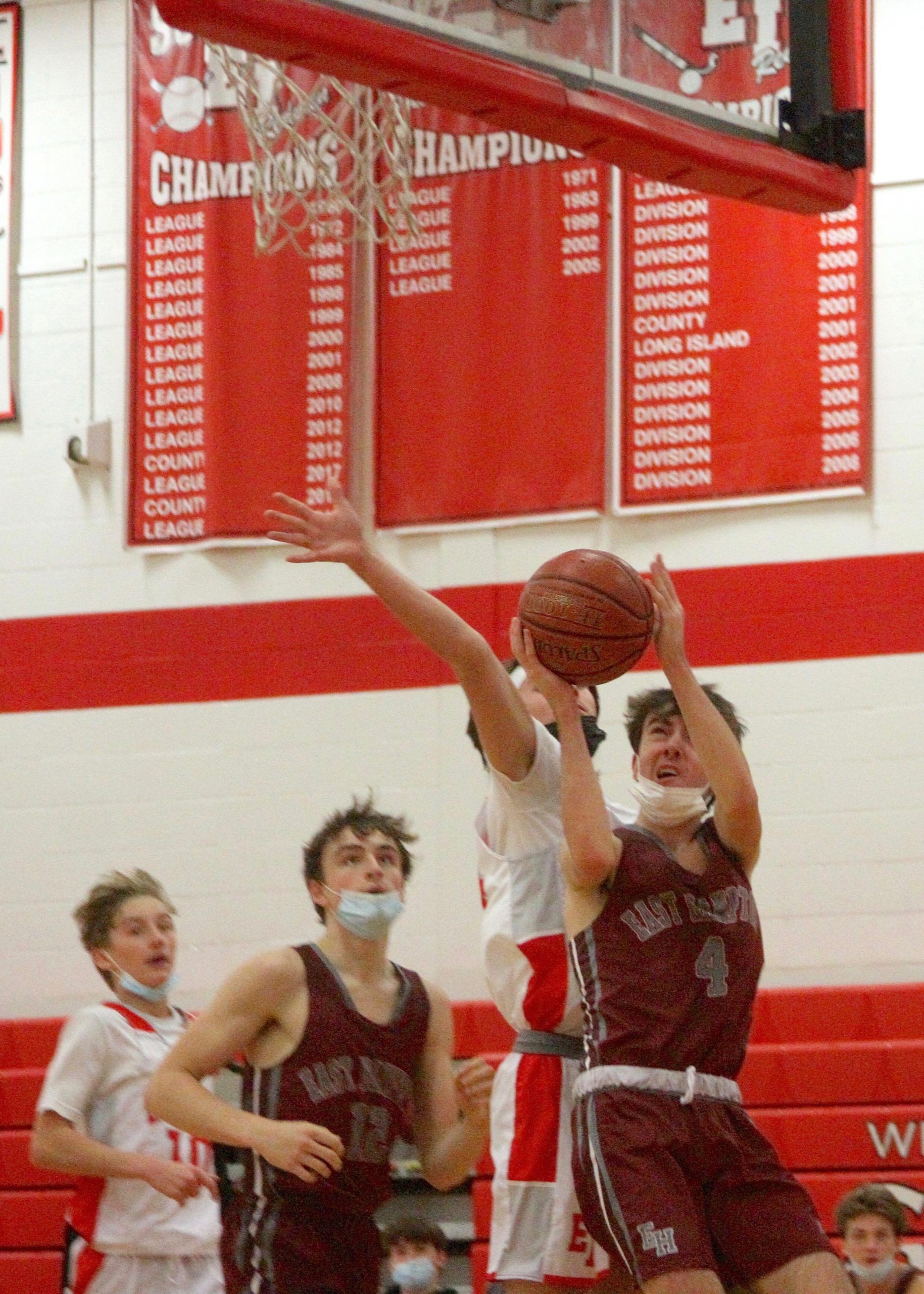 Sophomore guard Liam Fowkes reaches for a layup. DESIRÉE KEEGAN