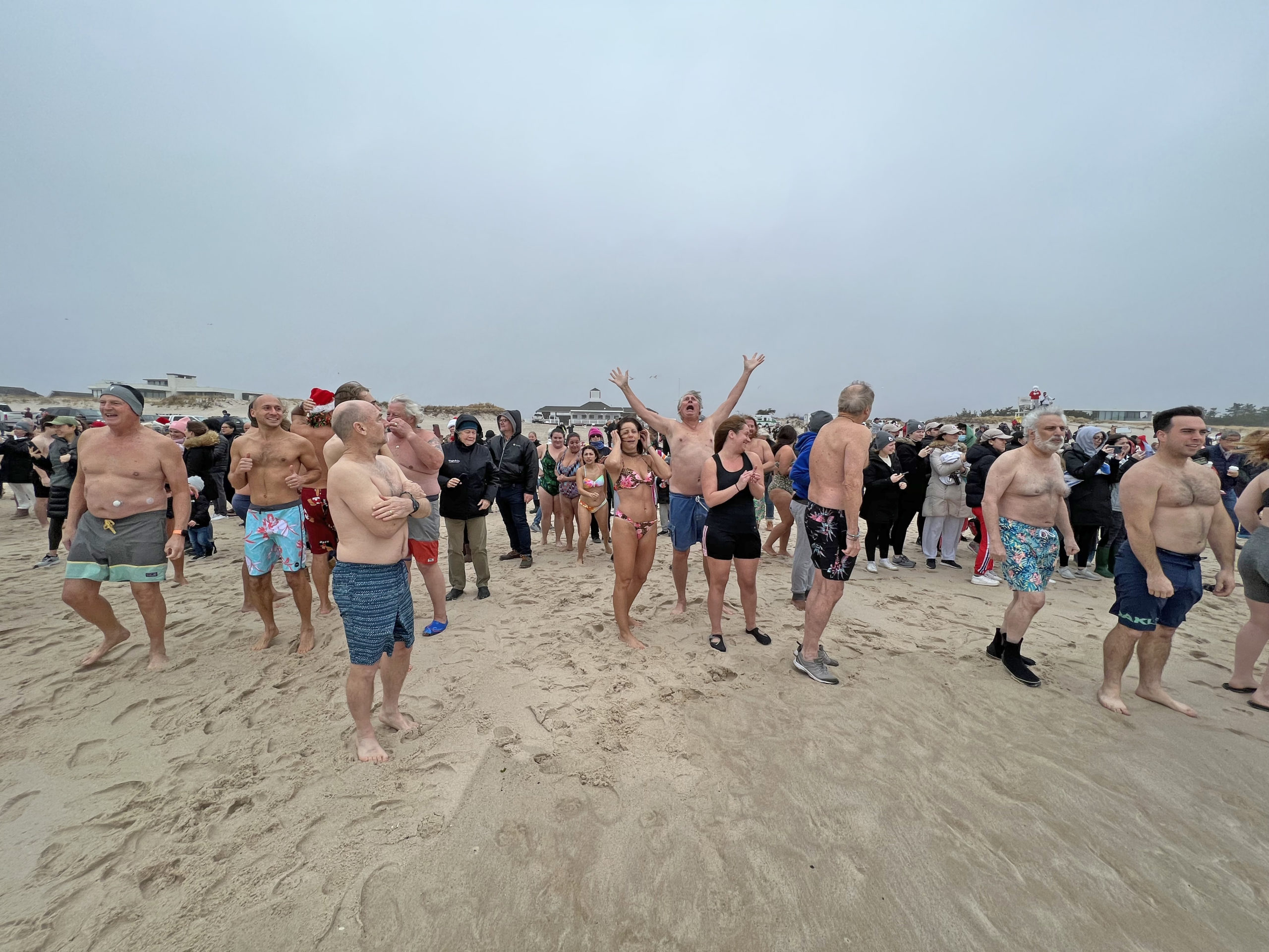 Participants of the 2021 Polar Bear Plunge brave rough conditions on Saturday morning.  DANA SHAW