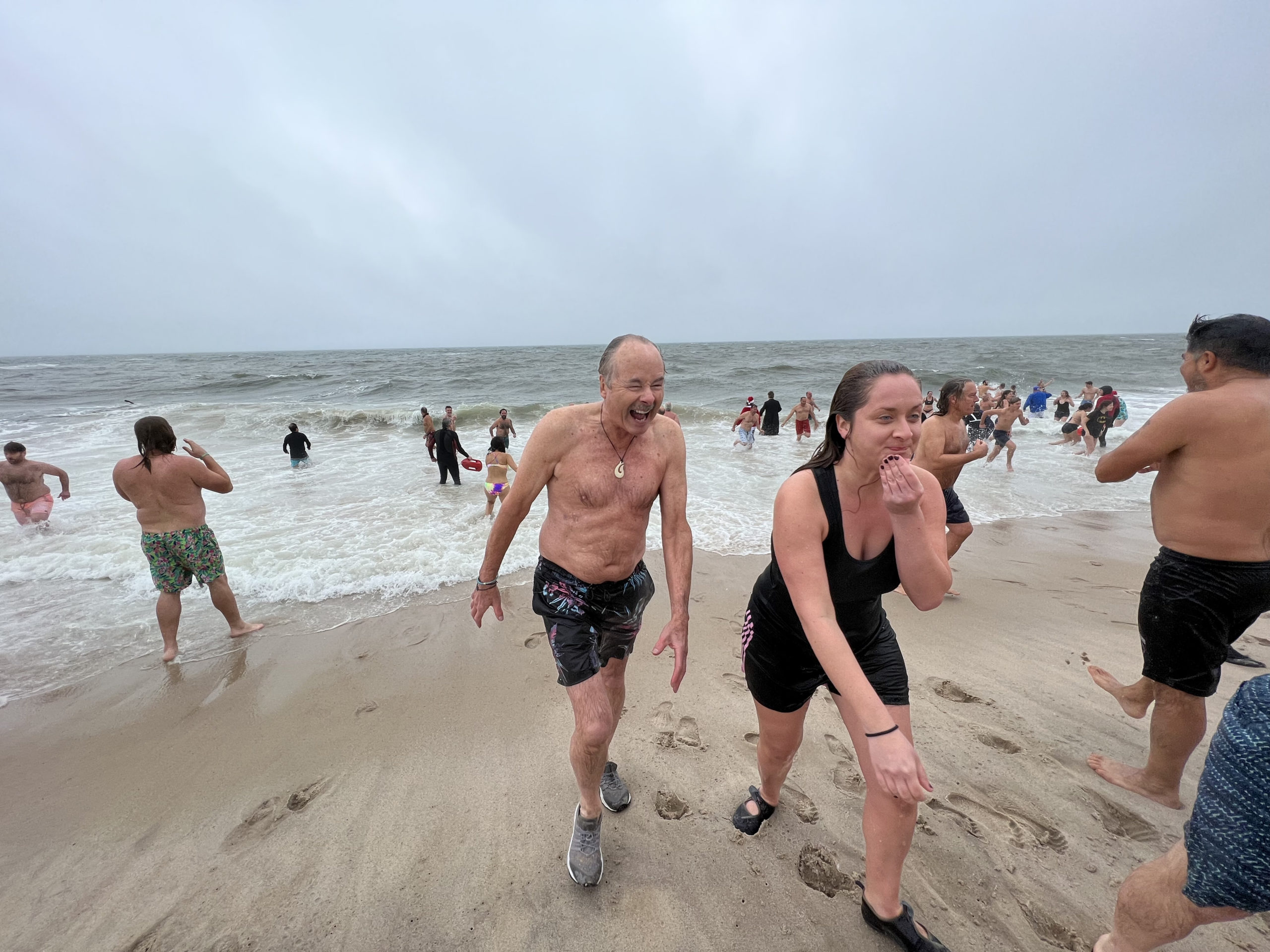 Participants of the 2021 Polar Bear Plunge brave rough conditions on Saturday morning.  DANA SHAW