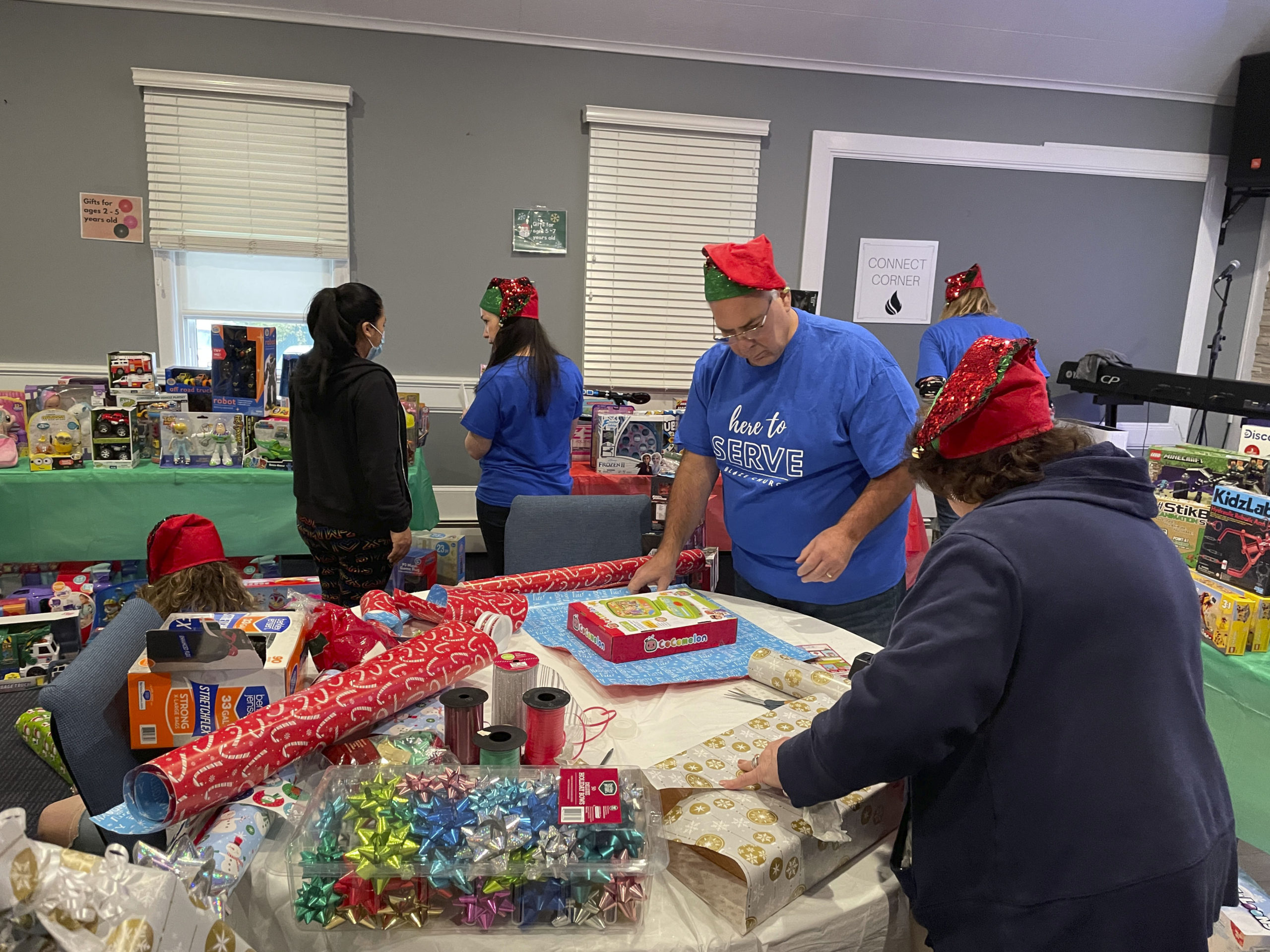 Members of Blaze Church in Flanders manned a 'toy store' in the sanctuary of the church on December 18. Parents were able to 'shop' for gifts for their kids.