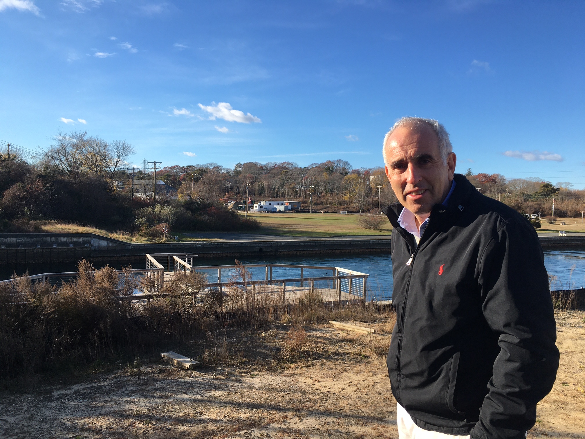 Southampton Town Supervisor Jay Schneiderman at the Hampton Boathouses property, showing one of two viewing platforms.