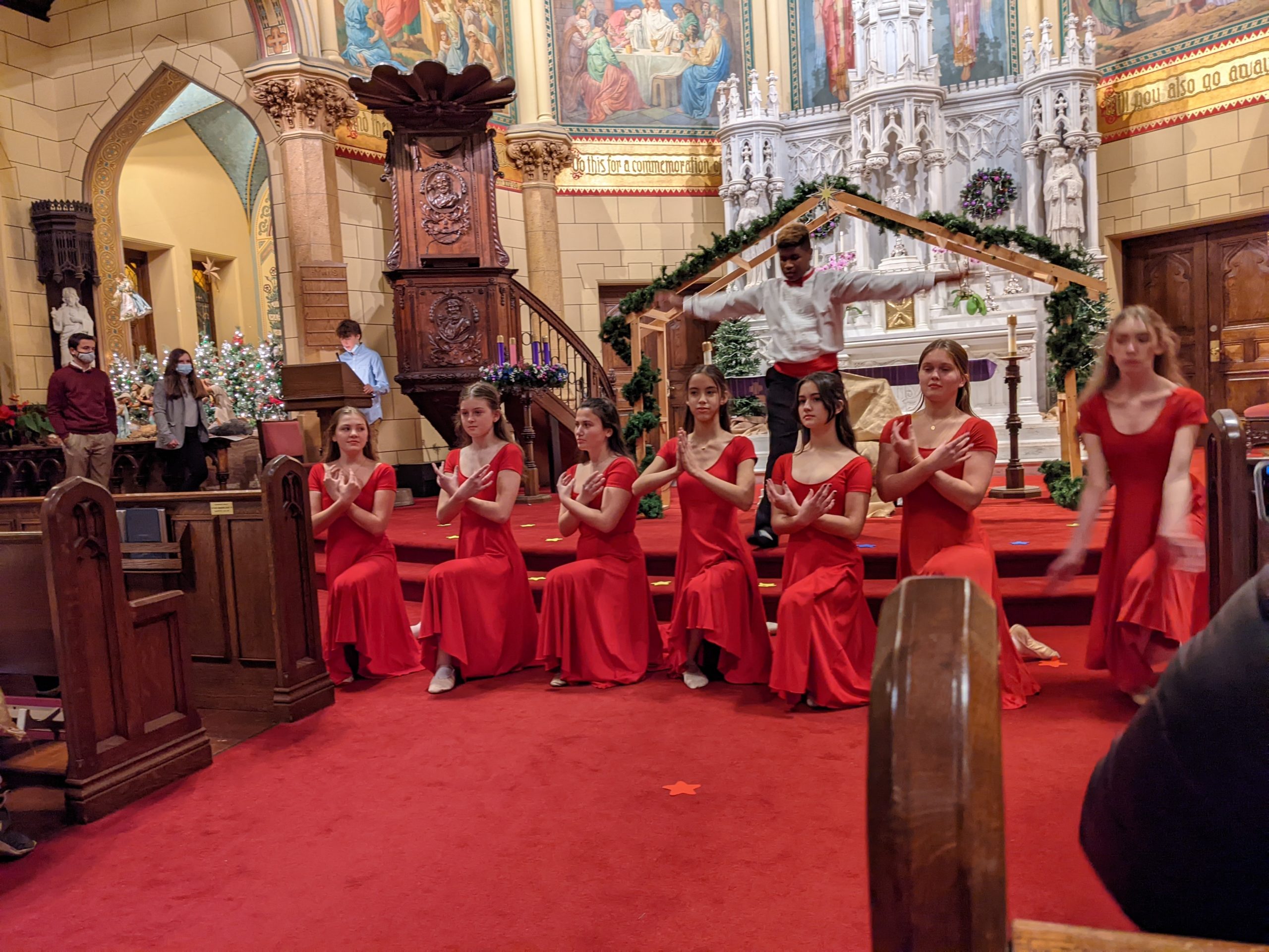 Members of the Dance Company of Our Lady of the Hamptons School performed for the parish family of the Basilica of the Sacred Hearts of Jesus and Mary at the annual Christmas pageant. The group then prepared to join the school community for the school show, “On-Time Delivery.”