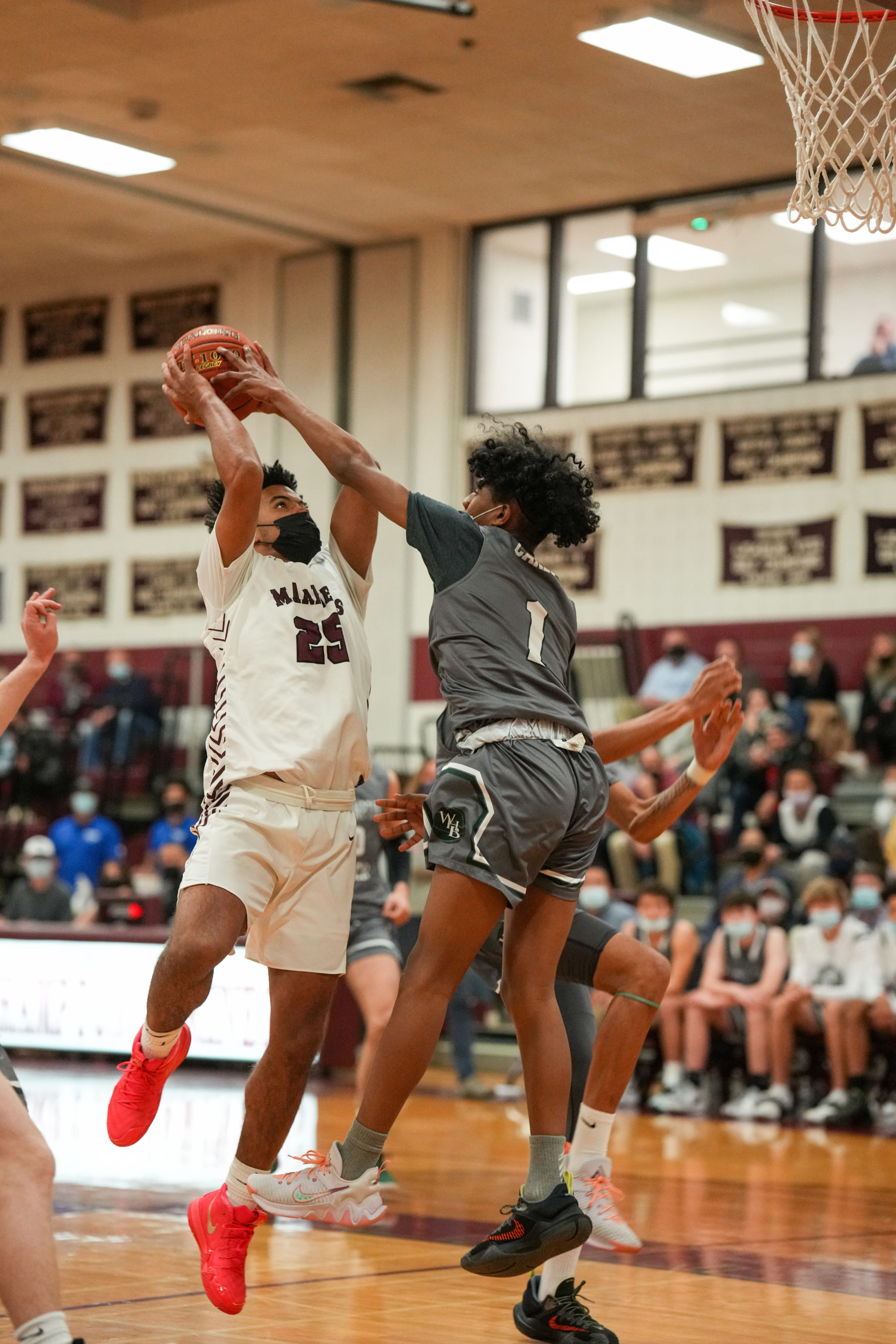 Southampton's LeBron Napier tries to score over Dominick White of Westhampton Beach. Napier scored a game-high 30 points.