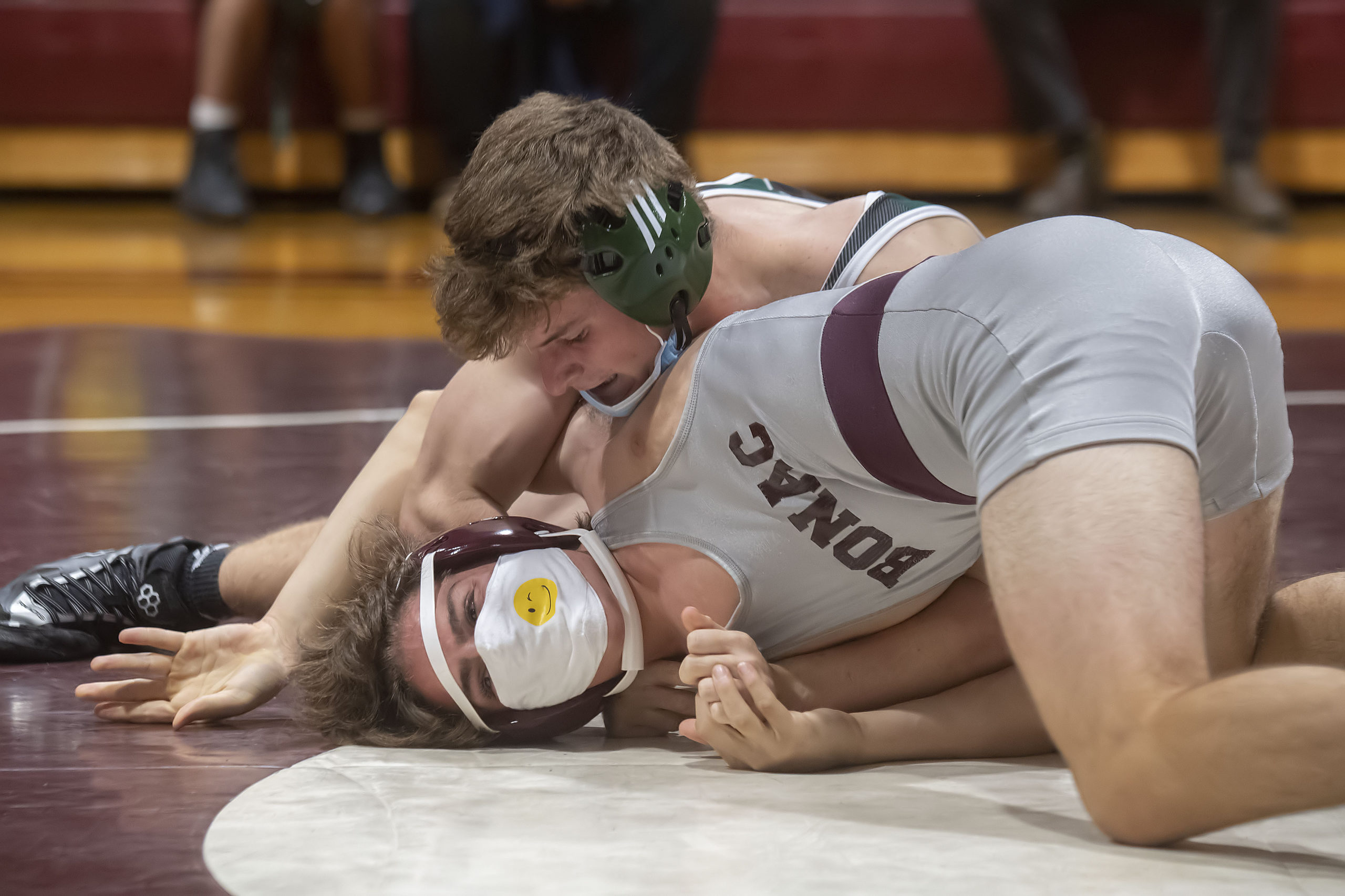 Bobby Stabile of Westhampton Beach works on pinning an East Hampton wrestler at the Sprig Gardner Tournament.