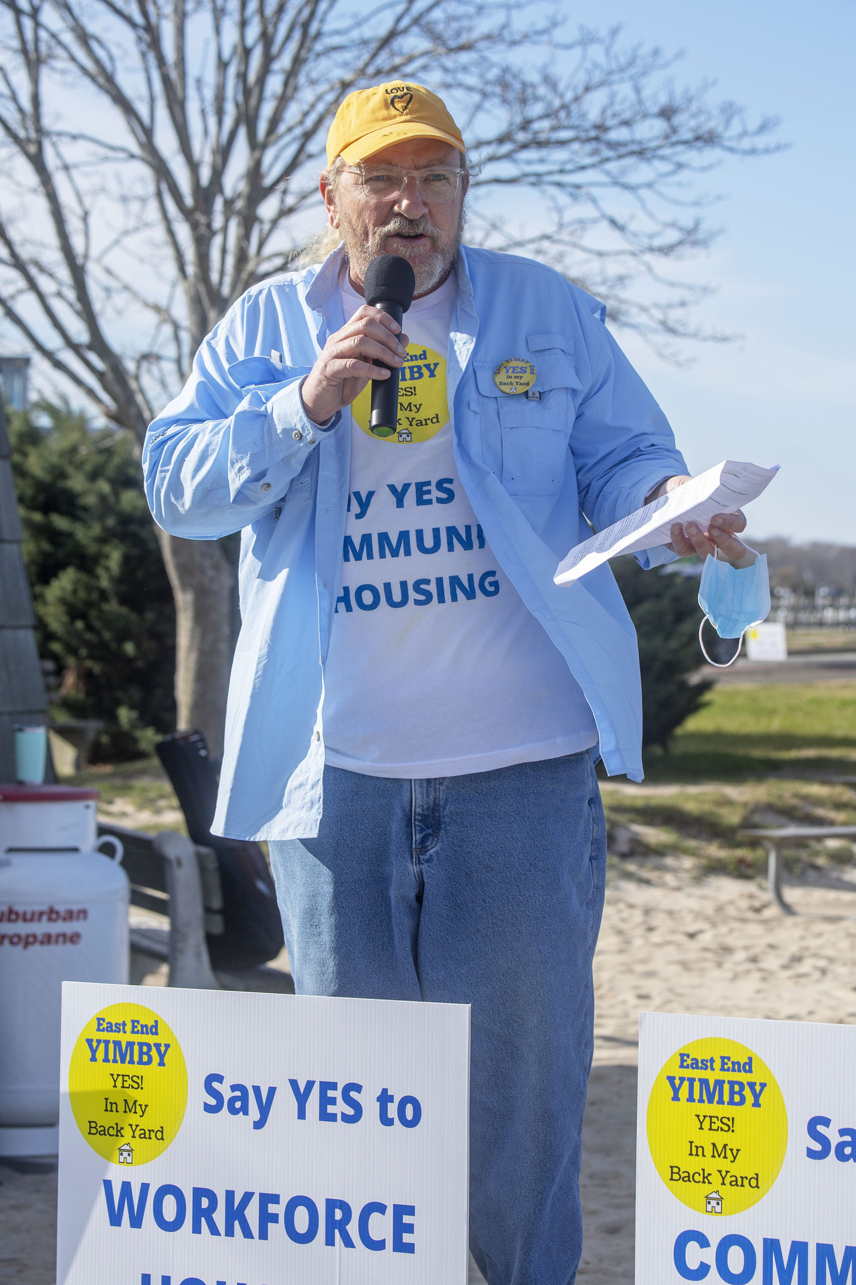 East End YIMBY Founder Michael Daly speaks at the East End YIMBY Rally for Affordable Housing, at the windmill on Long Wharf in Sag Harbor on Saturday.  MICHAEL HELLER