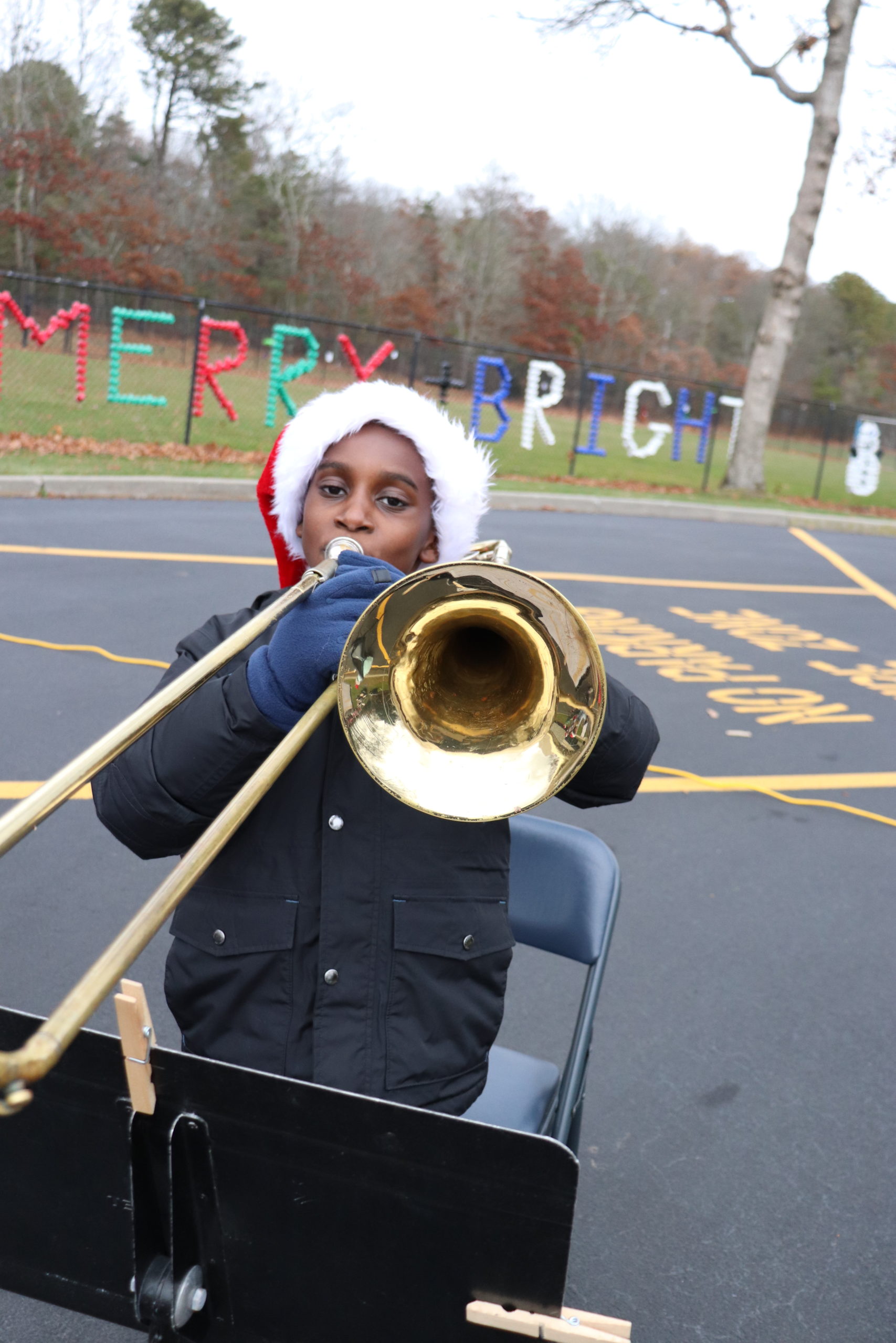 Raynor Country Day School recently hosted a series of winter concerts showcasing the vocal and instrumental talents of students. Third-grader Raphael Layne plays along with the junior band.