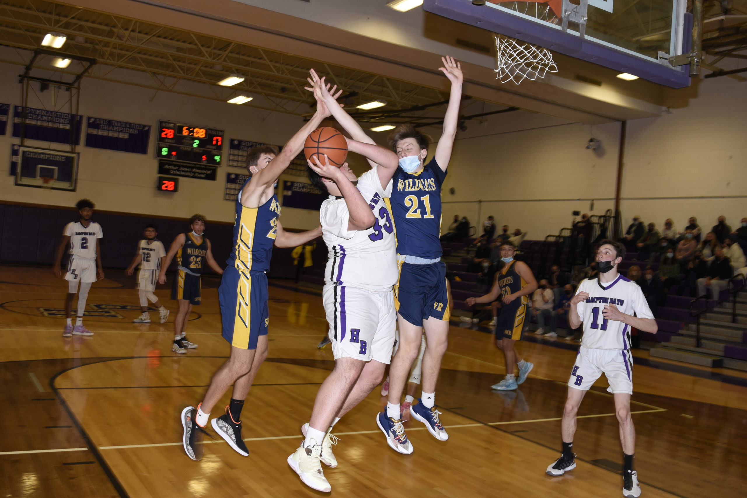 Hampton Bays sophomore Isaiah Lattanzio is fouled, again.