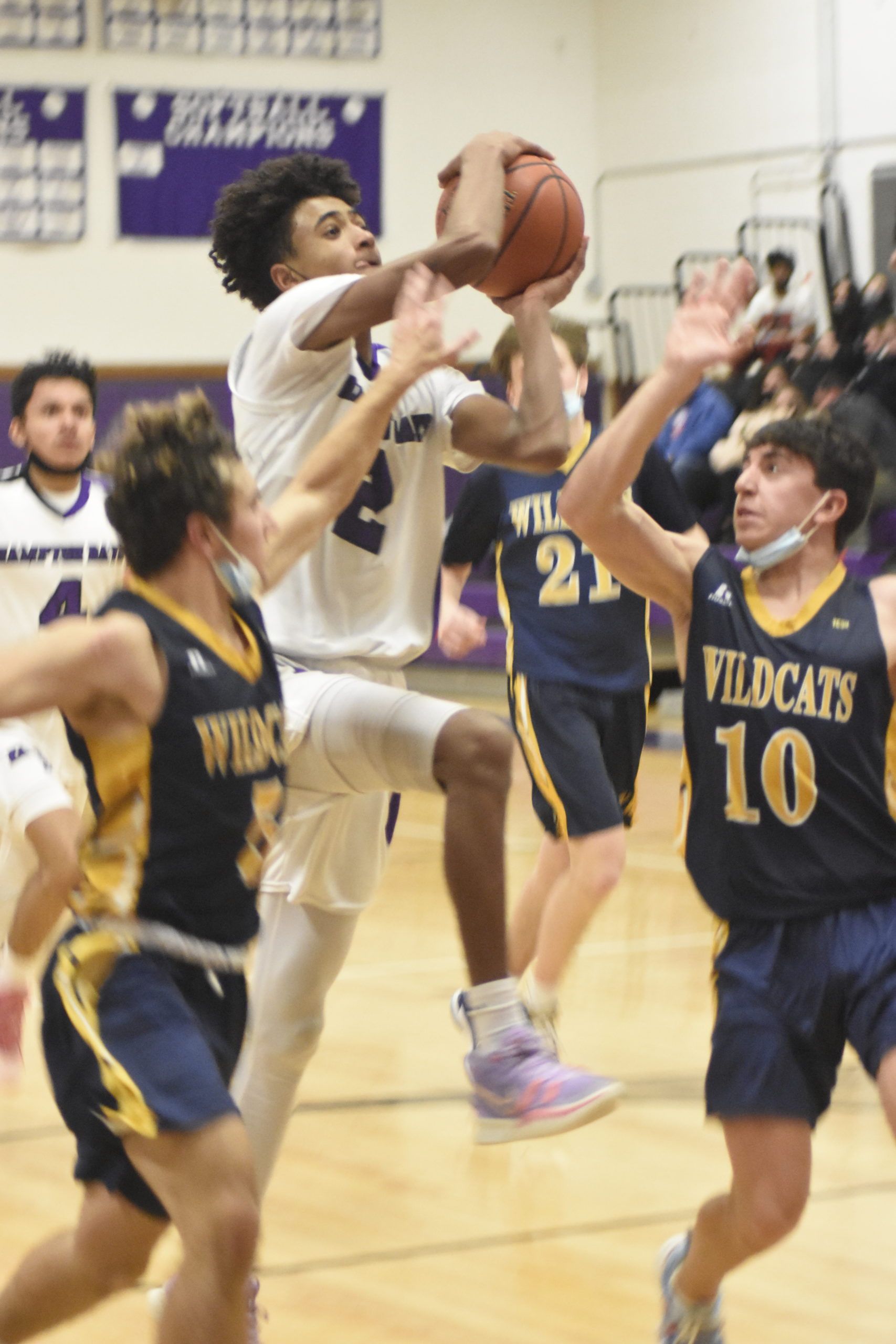 Bayman Kazmin Pensa-Johnson drives to the hoop and is fouled.