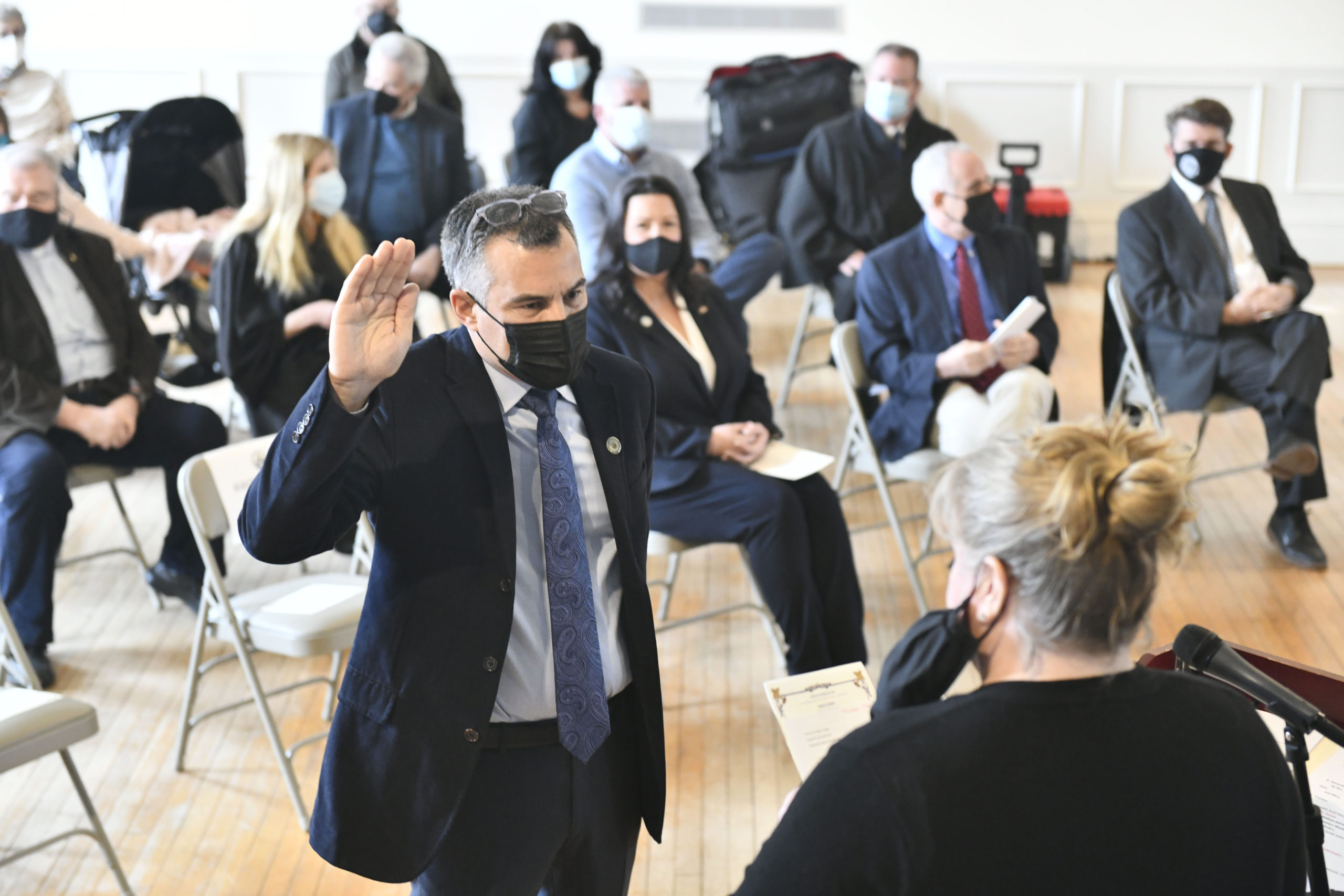 William H. Parash is sworn in as Town Trustee.