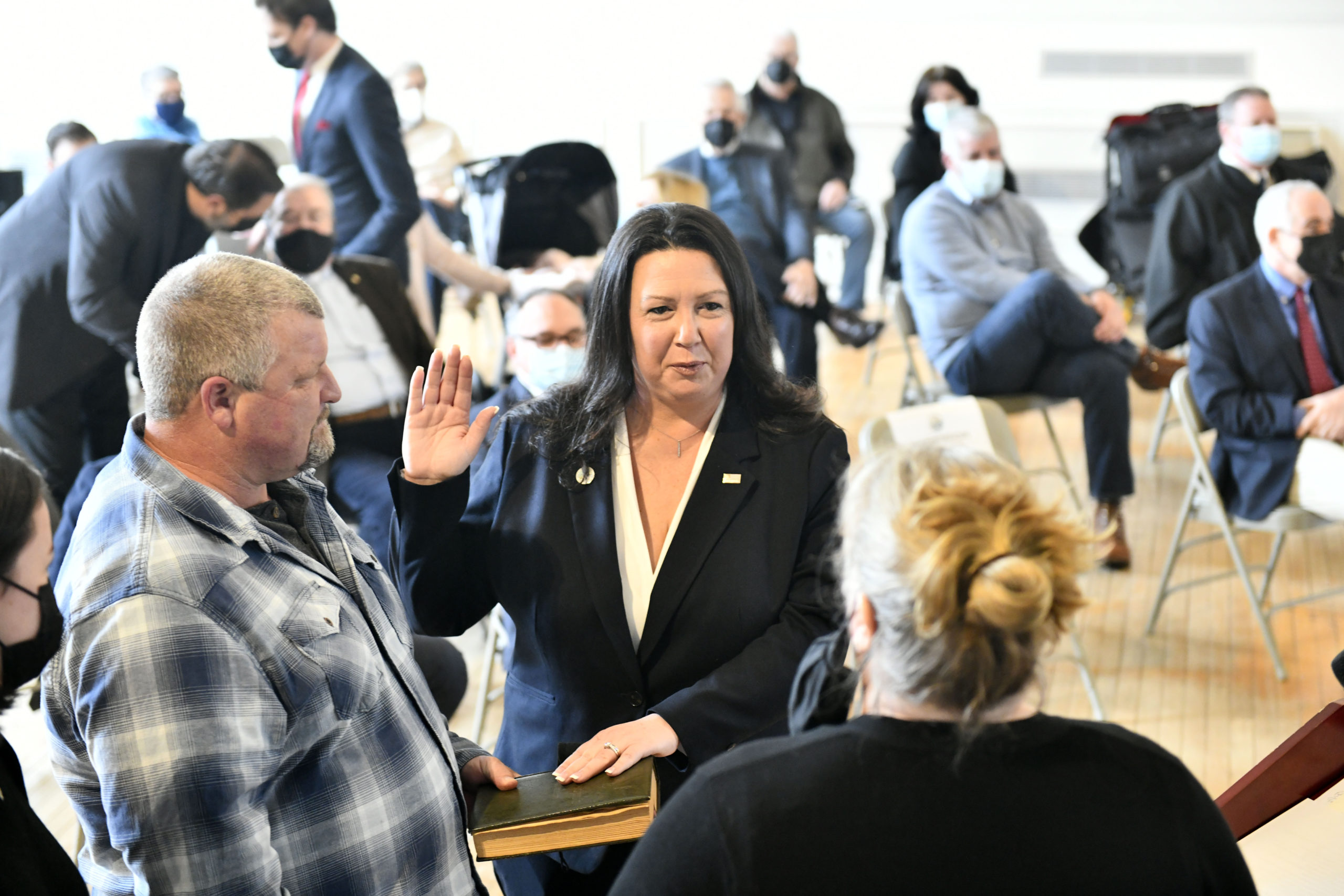 New Town Councilwoman Cynthia McNamara is sworn in on Wednesday.