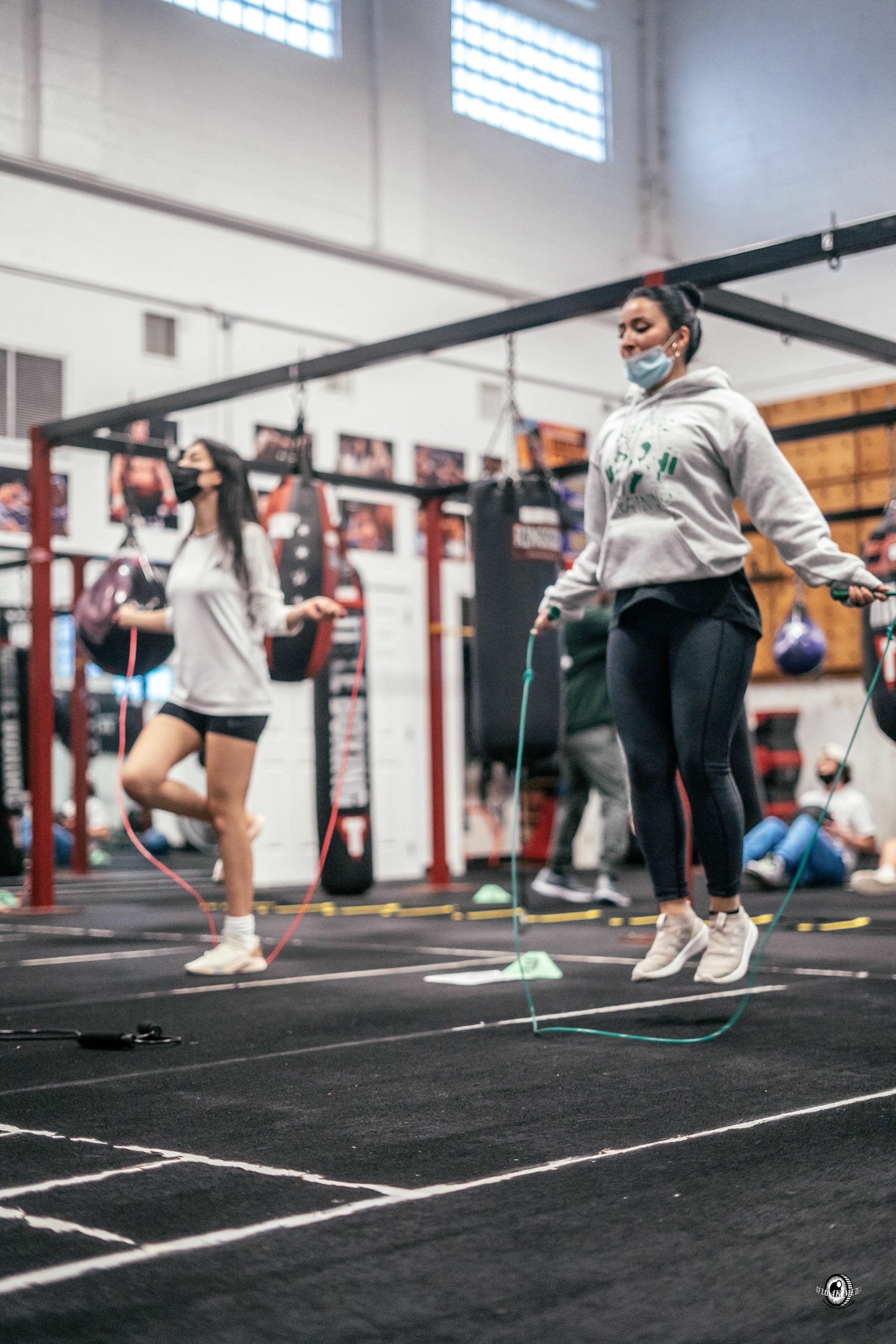 Hampton Bays ENL teacher Daniela Vargas does a jump rope drill with students. DYLAN FLORES