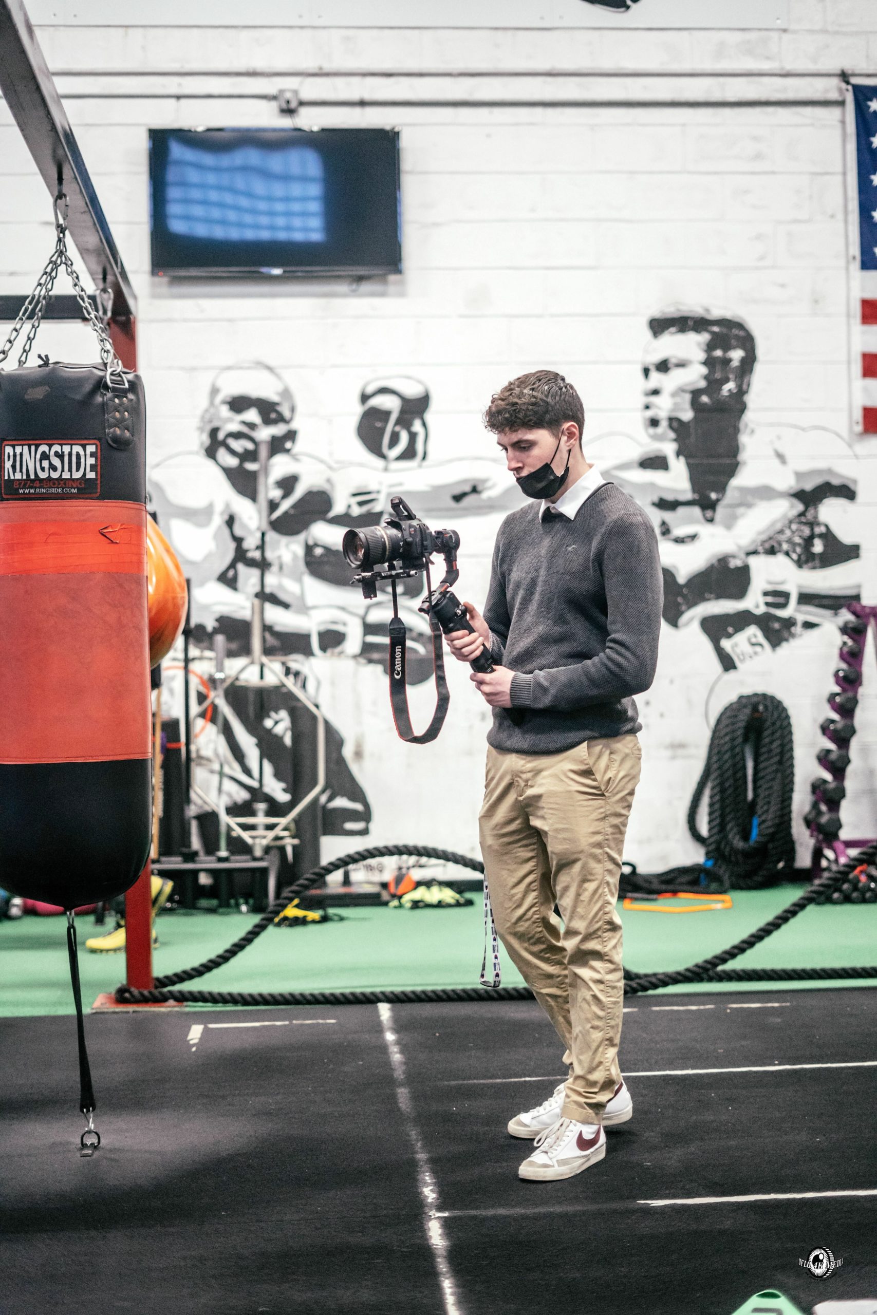 Hampton Bays student Dillon Ottati shoots some video during the school's boxing program at Hill Street in Southampton. DYLAN FLORES