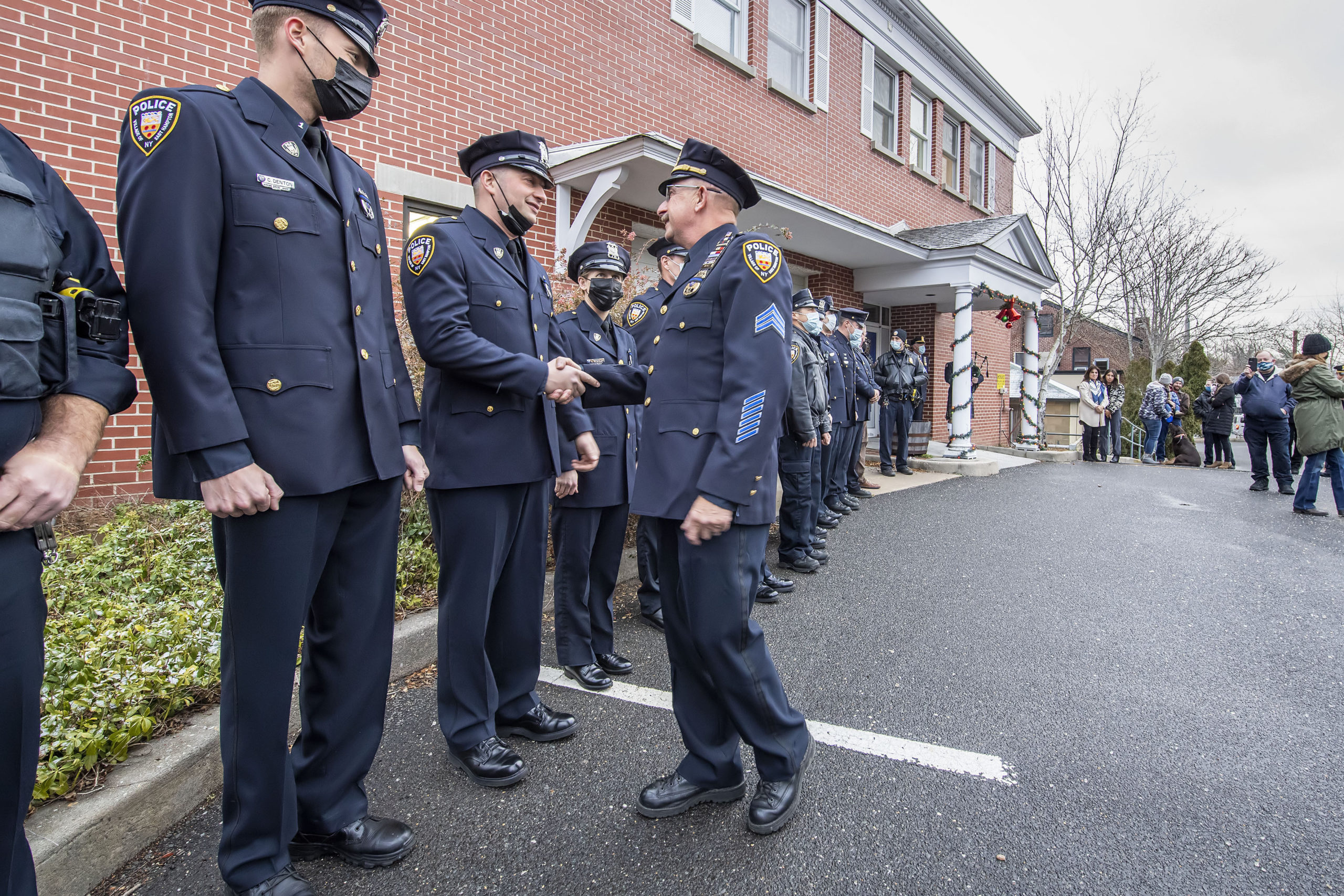 Each of his fellow officers was thanked in turn during the 