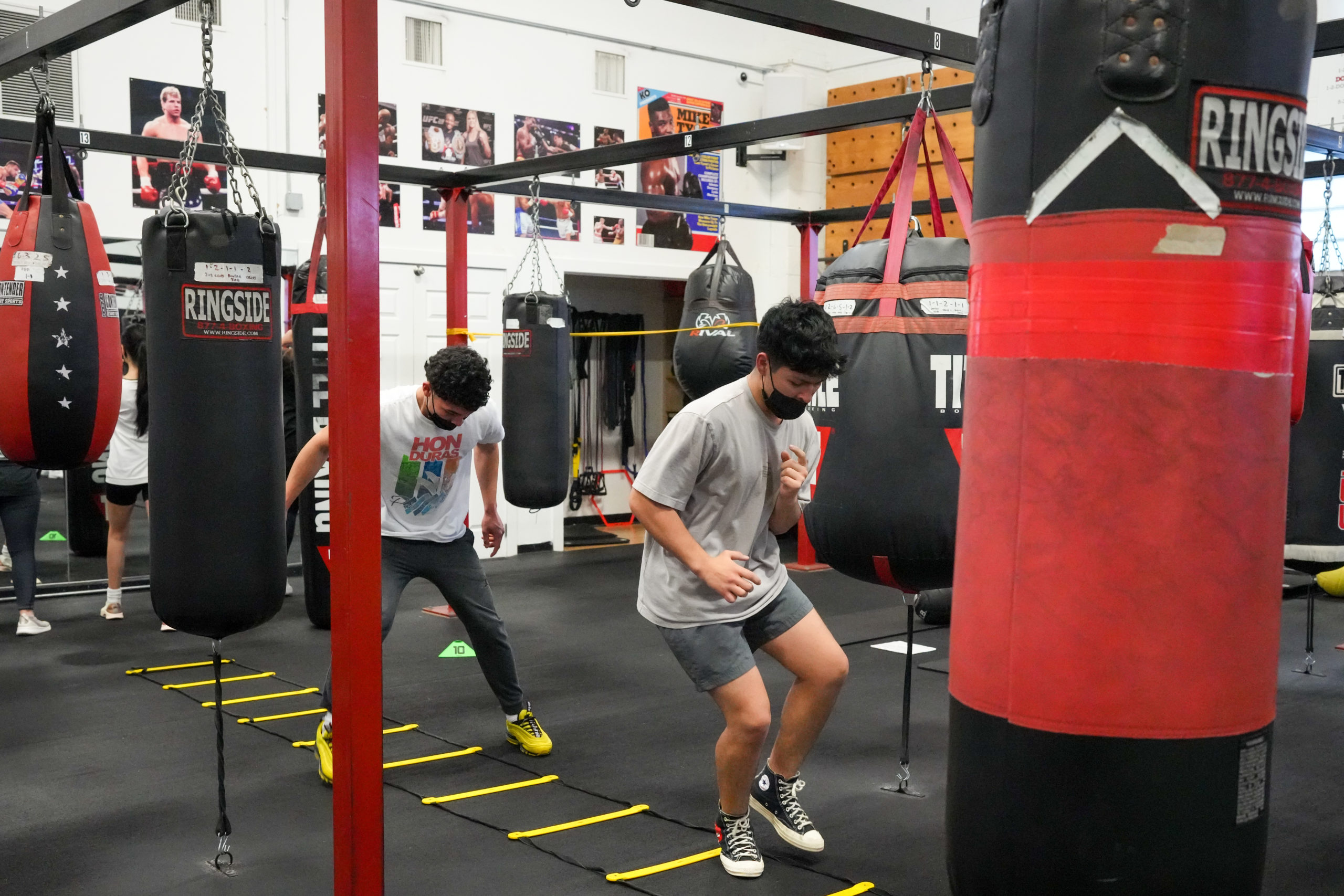 Hampton Bays students Erick Acosta and Jeronimo Velasquez do speed and agility training. RON ESPOSITO