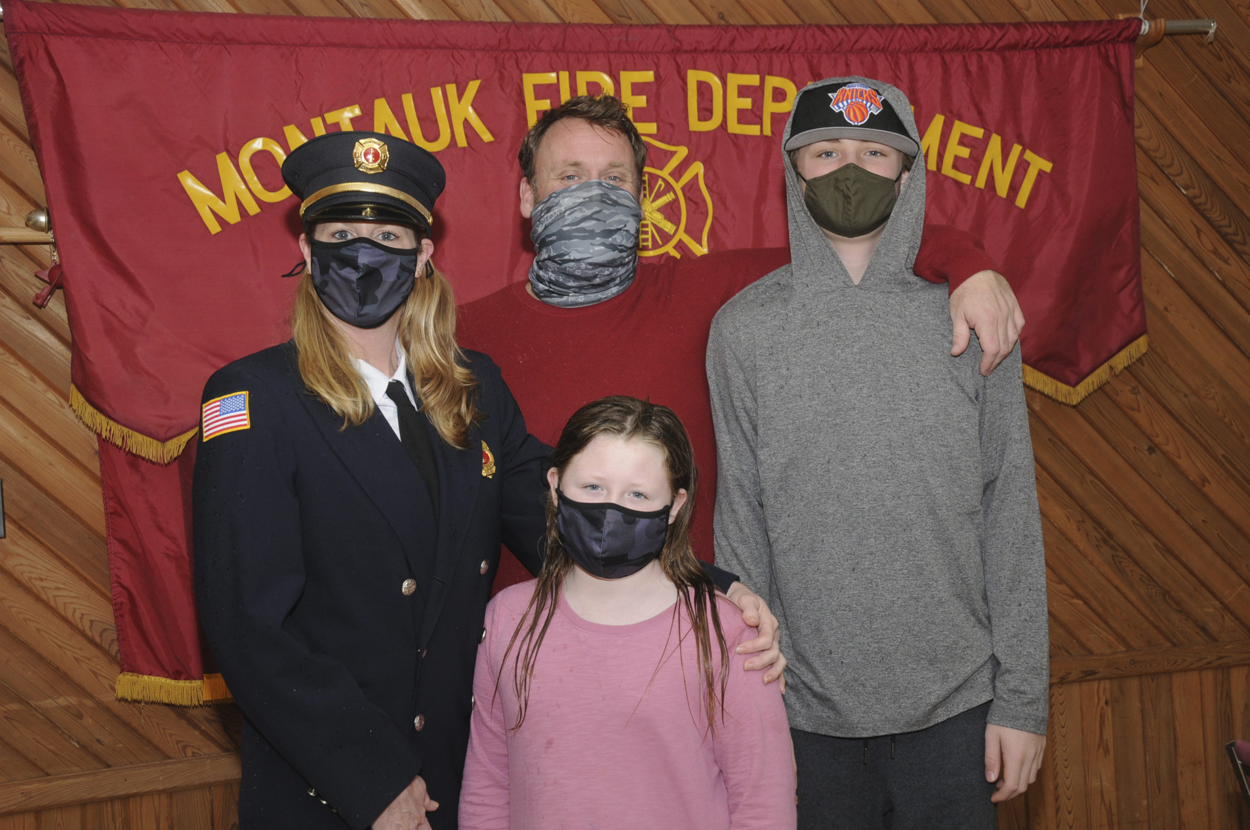 Installed as Lieutenant of Montauk Fire Department Company No. 2 on January 1, was Heather Matthews, who posed proudly with her husband Brian, son Sullivan and daughter Sadie.   RICHARD LEWIN