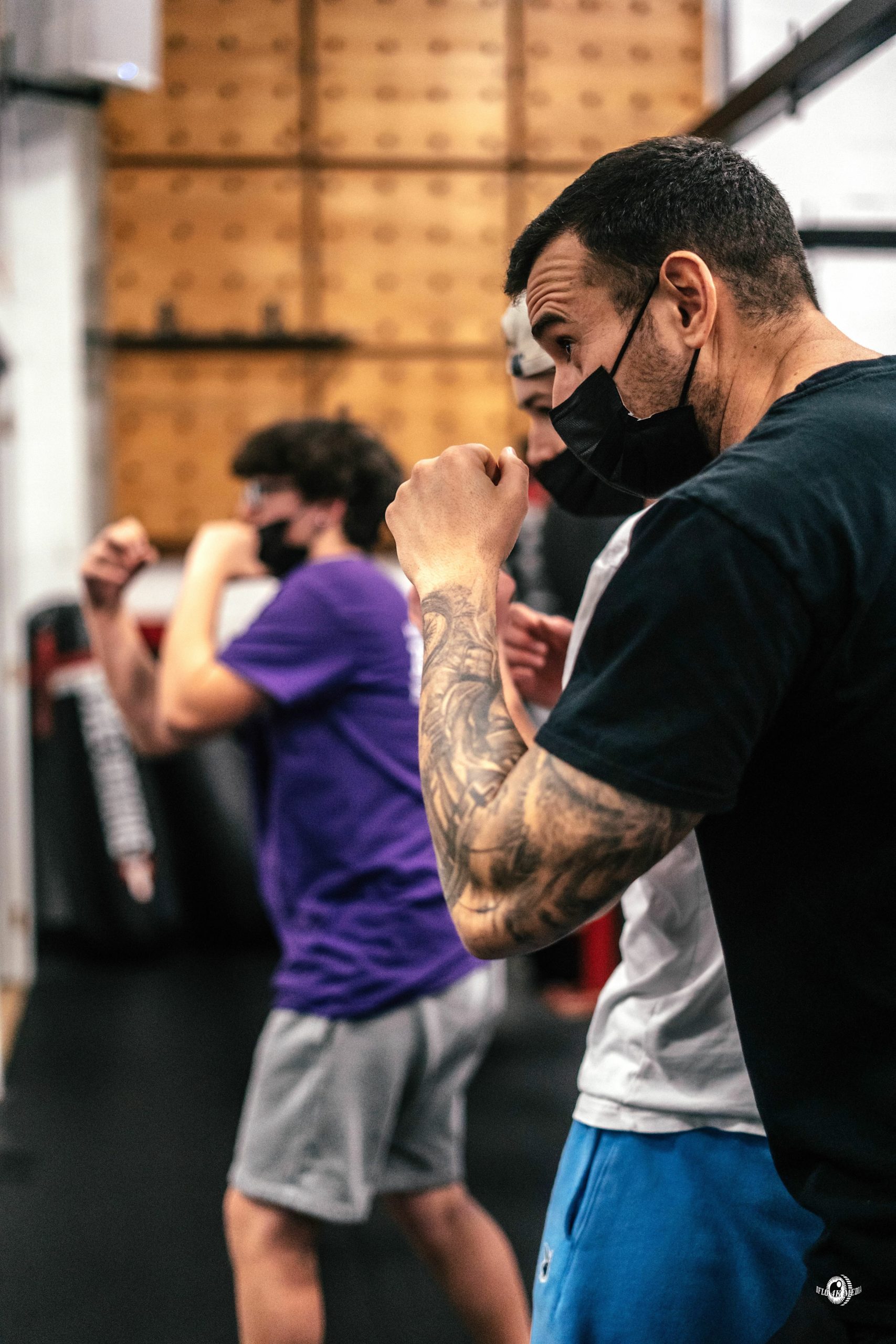 Hampton Bays social worker Chris DeRosa  demonstrates how to throw punches. DYLAN FLORES