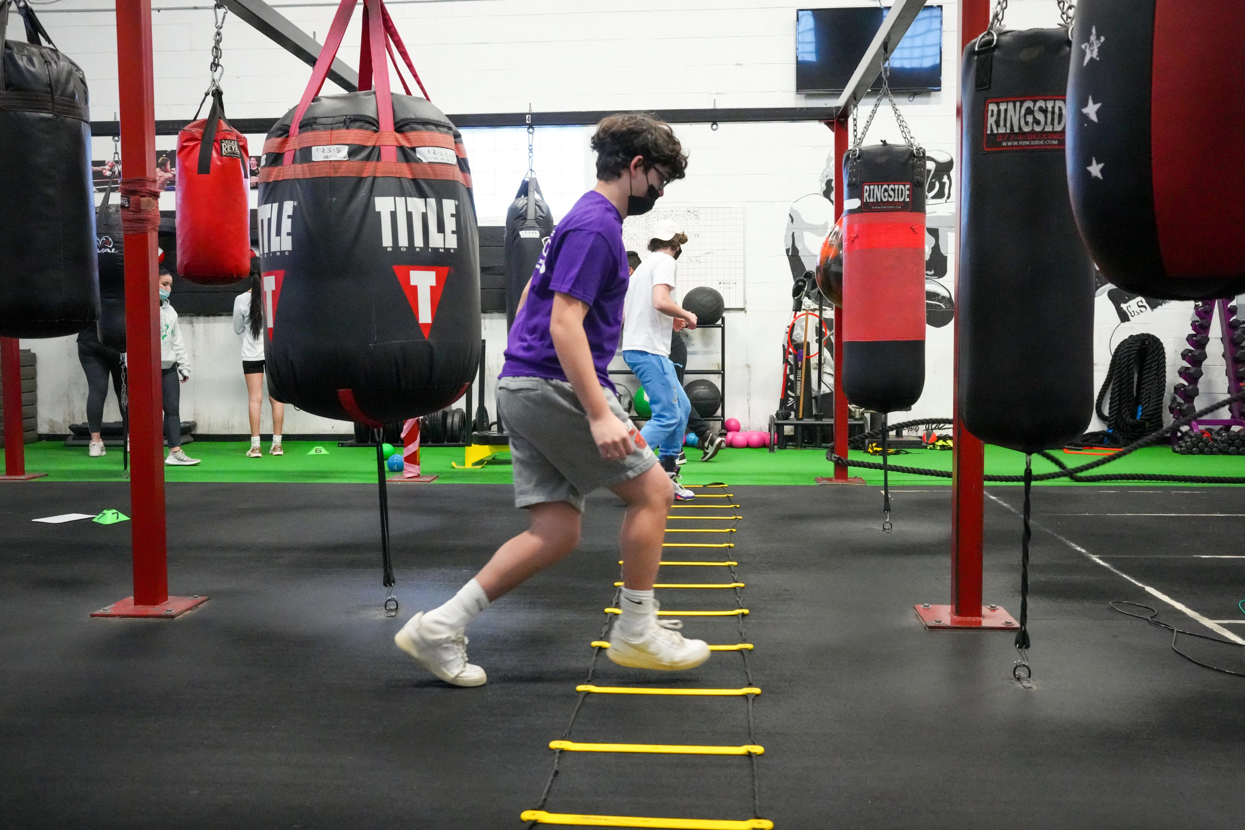 Hampton Bays student Timmy McCarthy does a speed and agility drill. RON ESPOSITO