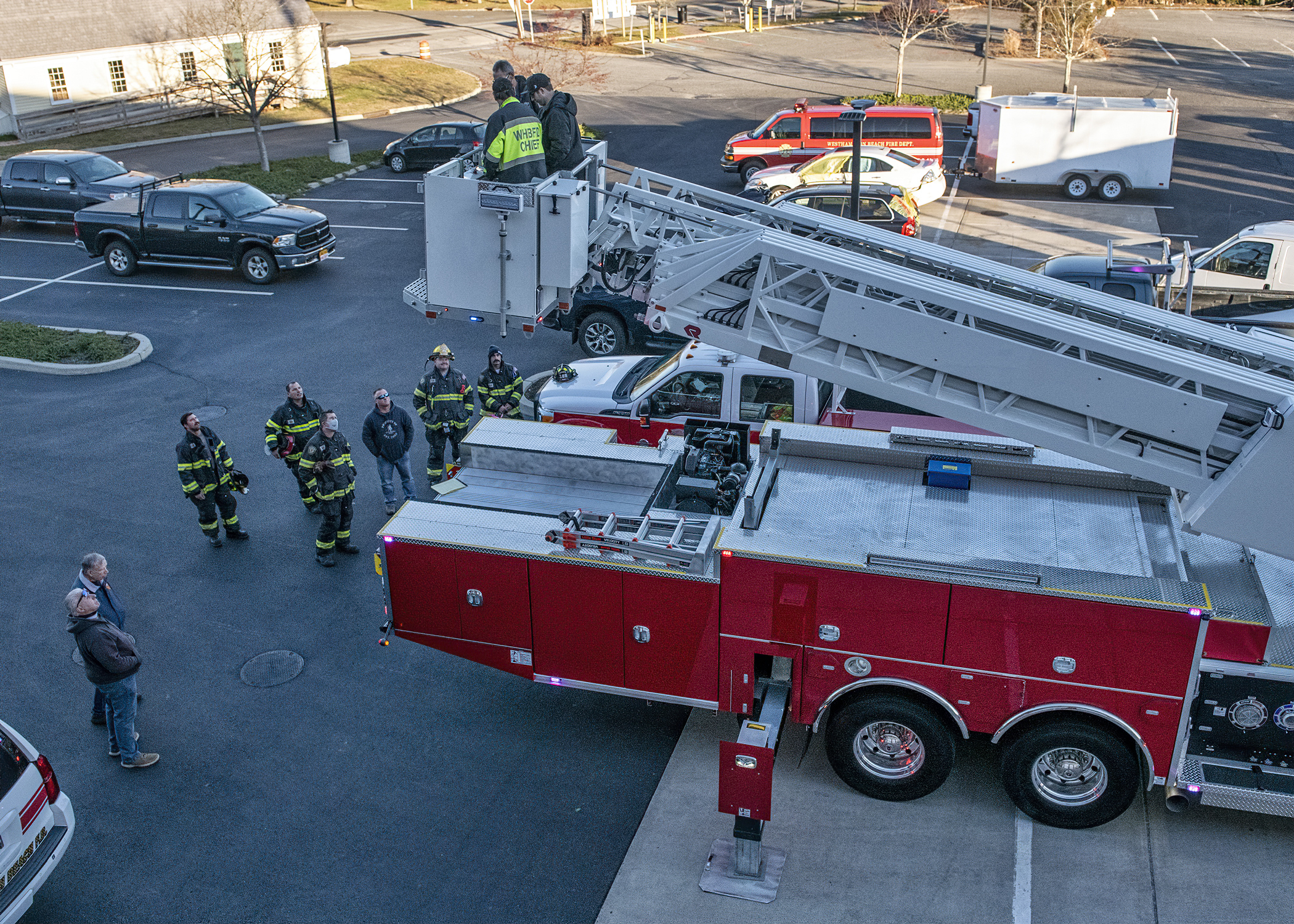 The volunteers fly the tower fo the first time on the Westhampton Beach Fire Department’s new Rosenbauer tower ladder on Monday, December 20.  COURTESY WESTHAMPTON BEACH FIRE DEPARTMENT