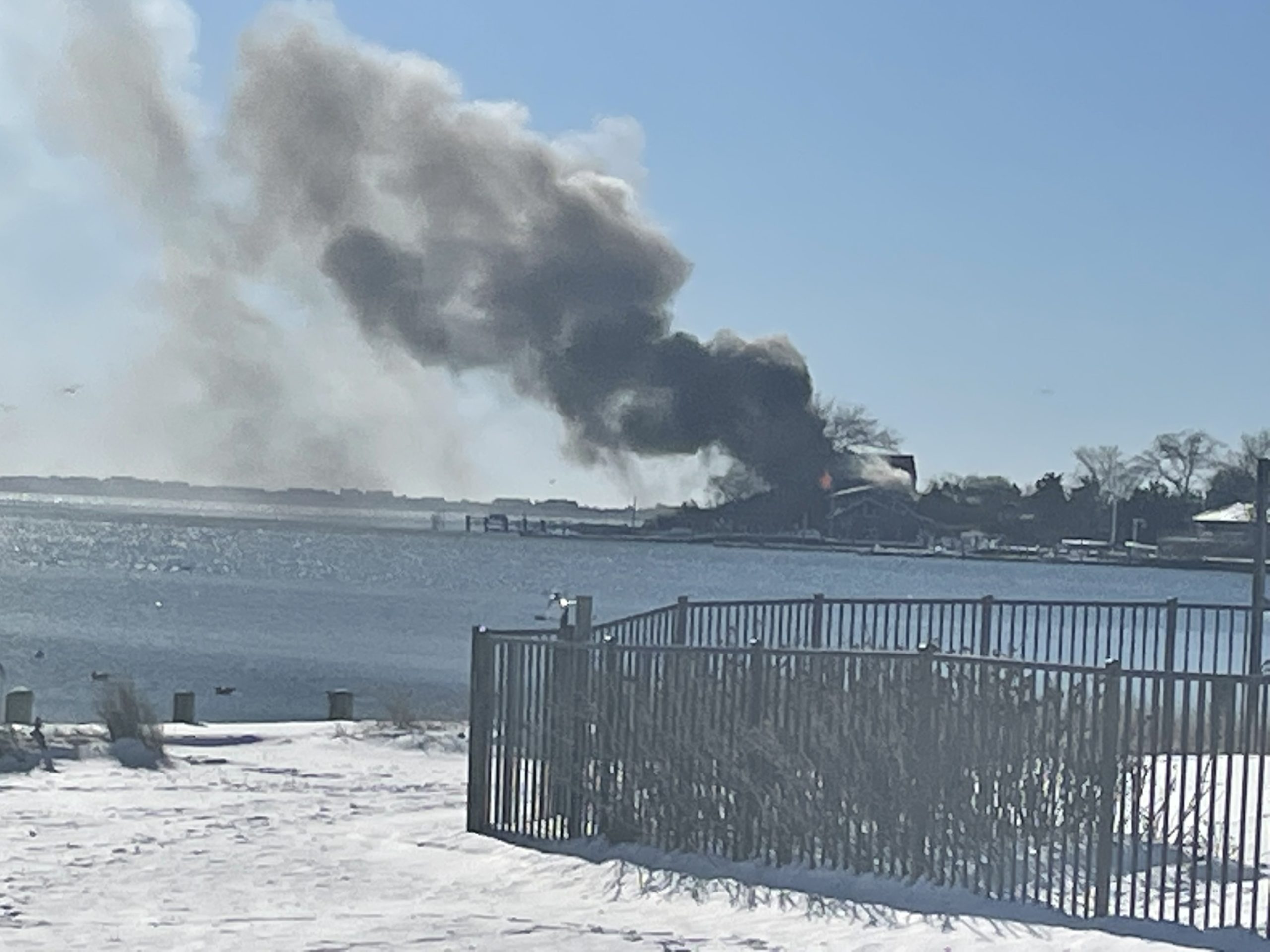 Fire destroyed a Shinnecock Hills home and damaged another on Saturday.