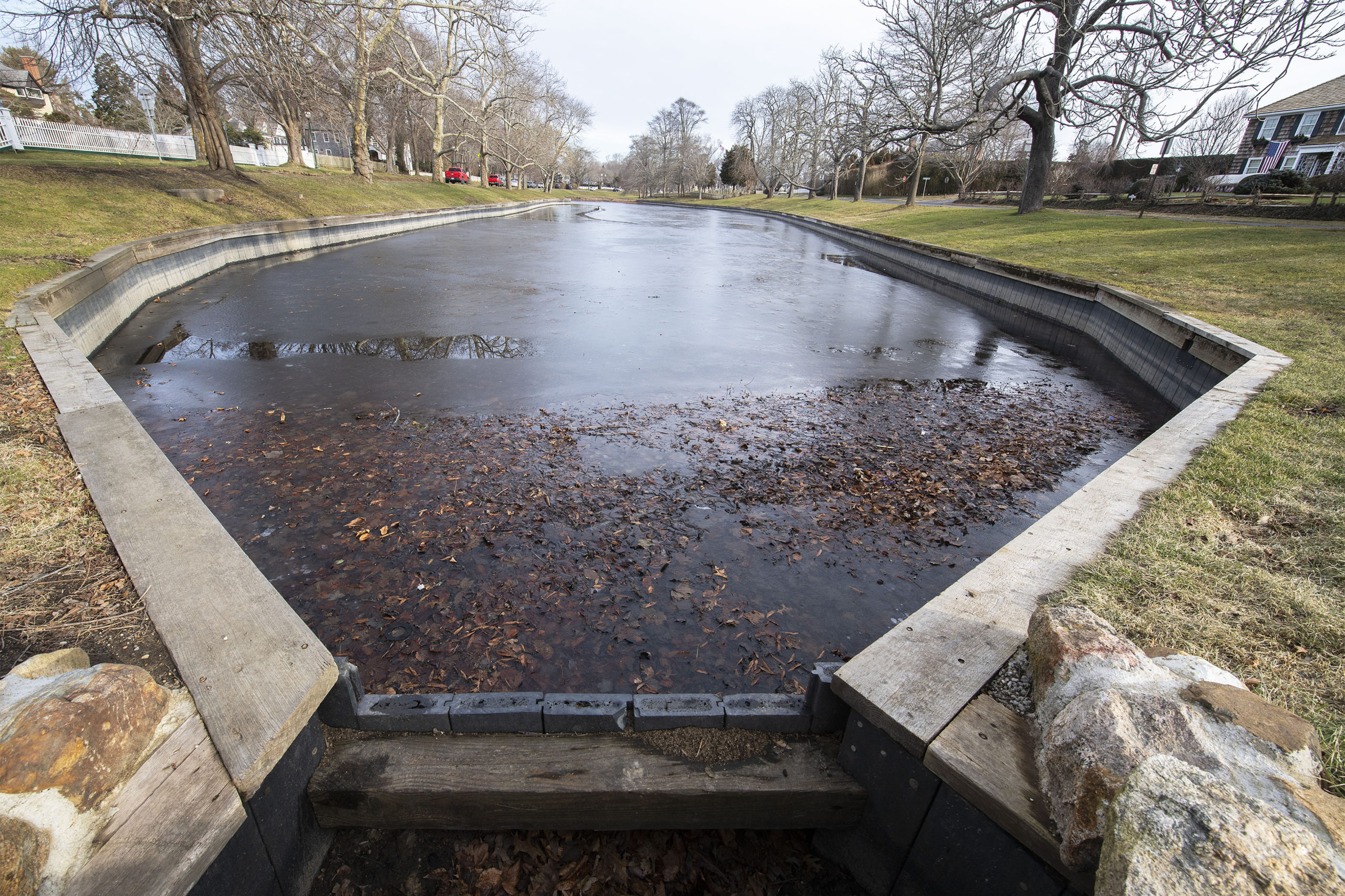 A dredging project, a malfunctioning pump and leaking bulkhead have prevented Town Pond, at the entrance to East Hampton Village, from refilling.