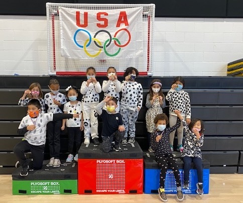 Bridgehampton School students received
their medals after participating in five simulated Olympic events: hockey, speed skating,
biathlon, curling and bobsledding.