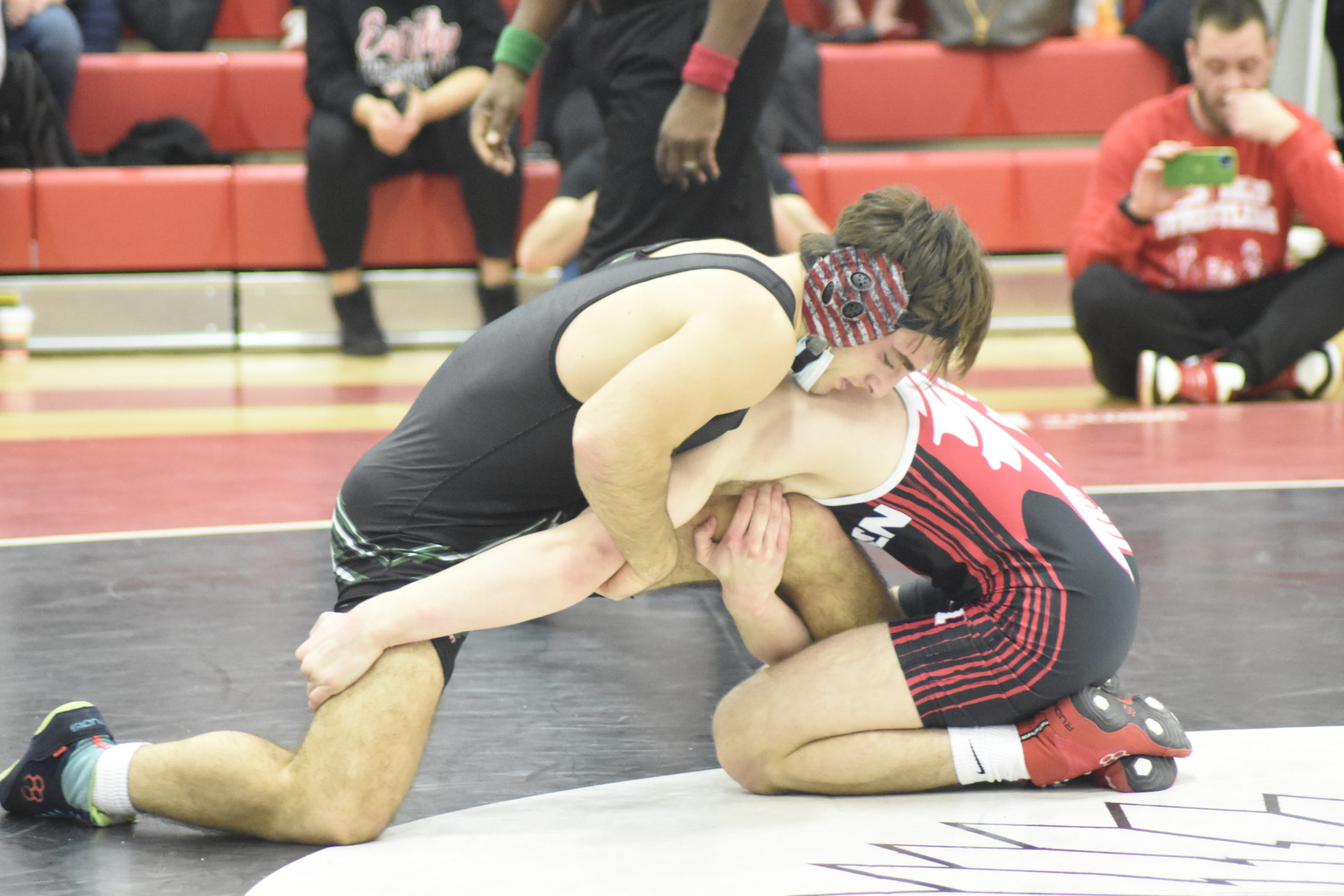 Aidan McKeon of Westhampton Beach works against East Islip's Rob Dombrowski in the 160-pound league title bout.