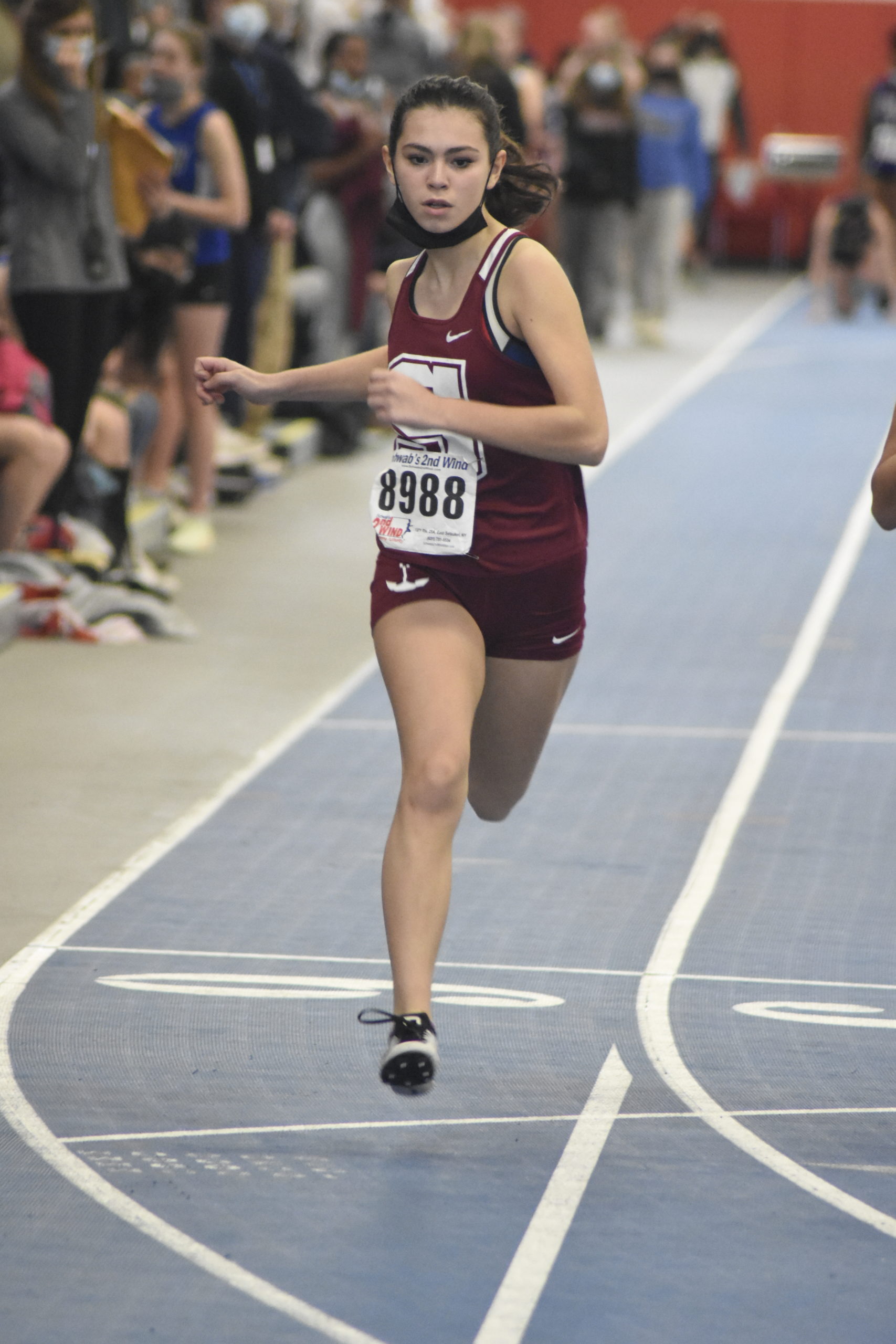 Southampton's Sofia Oliveri crosses the finish line in the 55-meter dash.