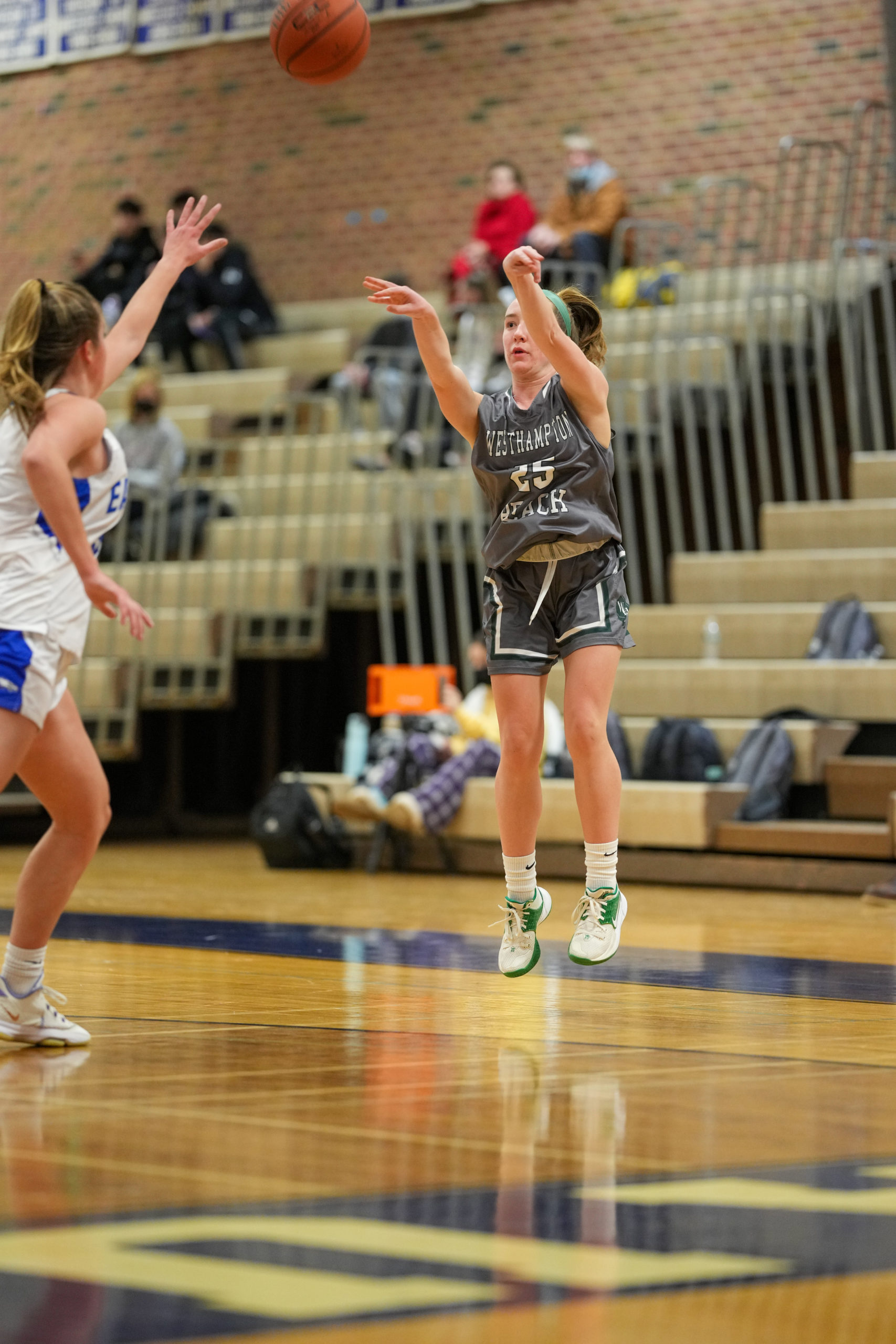 Lily Berchin shoots from three-point range. RON ESPOSITO